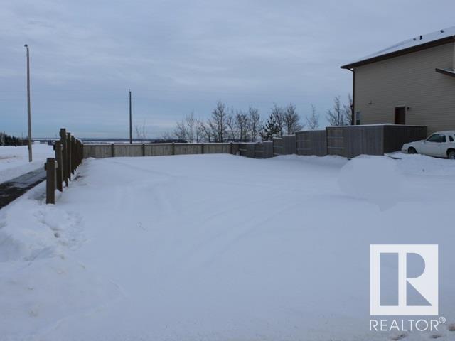 Super location! Corner lot at entrance to Beaverhill View Crescent subdivision on the north edge of the growing Town of Tofield. 53 ft wide lot will accommodate a great number of house plans. New houses surround. Build a Two Storey and you'll have a nice view of the countryside and Beaverhill Lake. The Town of Tofield offers a RESIDENTIAL TAX INCENTIVE for new construction (75/50/25).  Fenced on two sides.  Just a short walk to both of Tofield's schools and a few blocks from the Tofield Health Centre.  Lot measures 53 feet by 131 feet. Welcome to Tofield -- Welcome home!