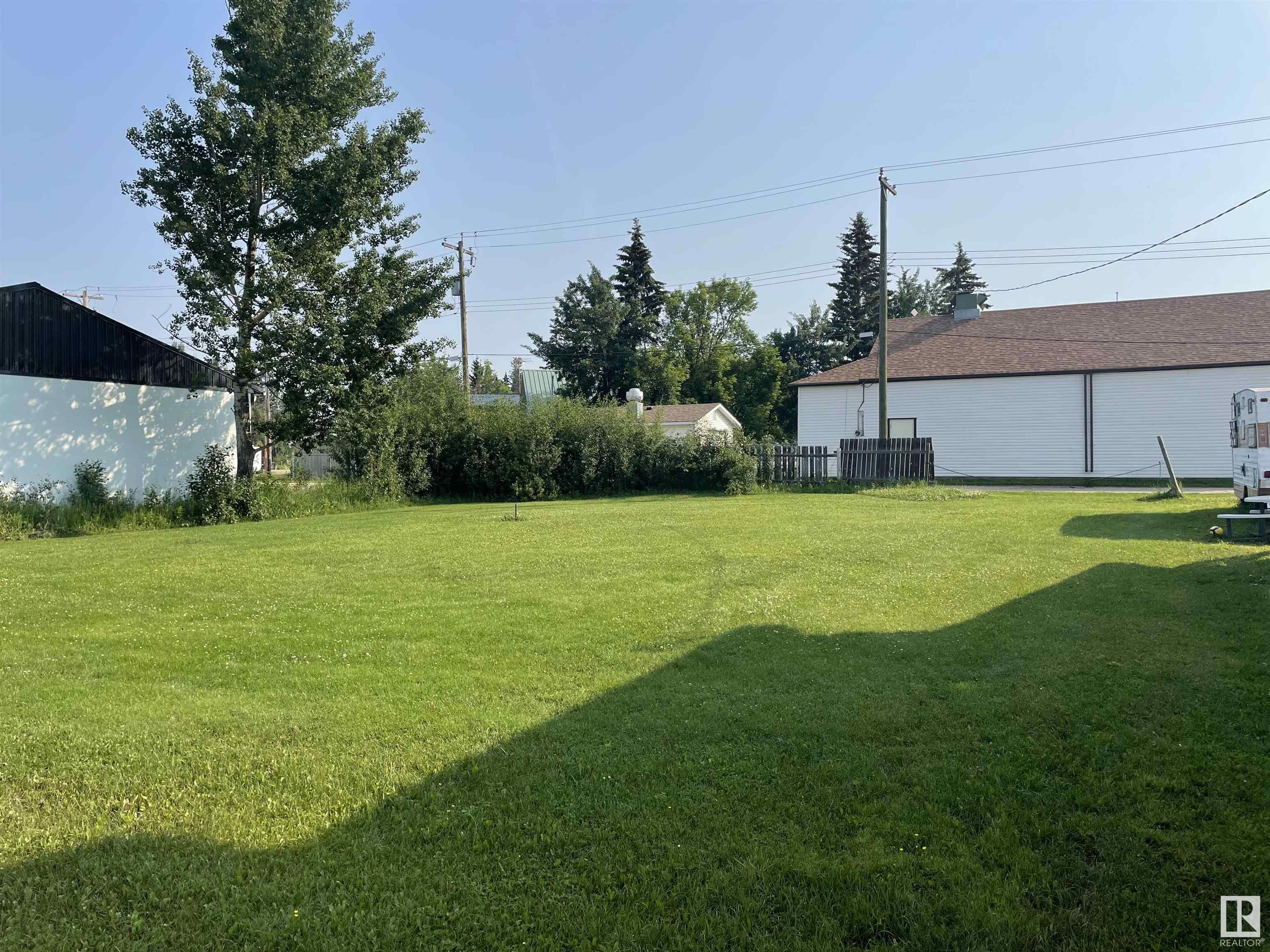 39.5? x 100? vacant lot overlooking the water front on Pigeon Lake at Mulhurst Bay.  Zoned Urban Commercial. Adjoining lot for sale as well.