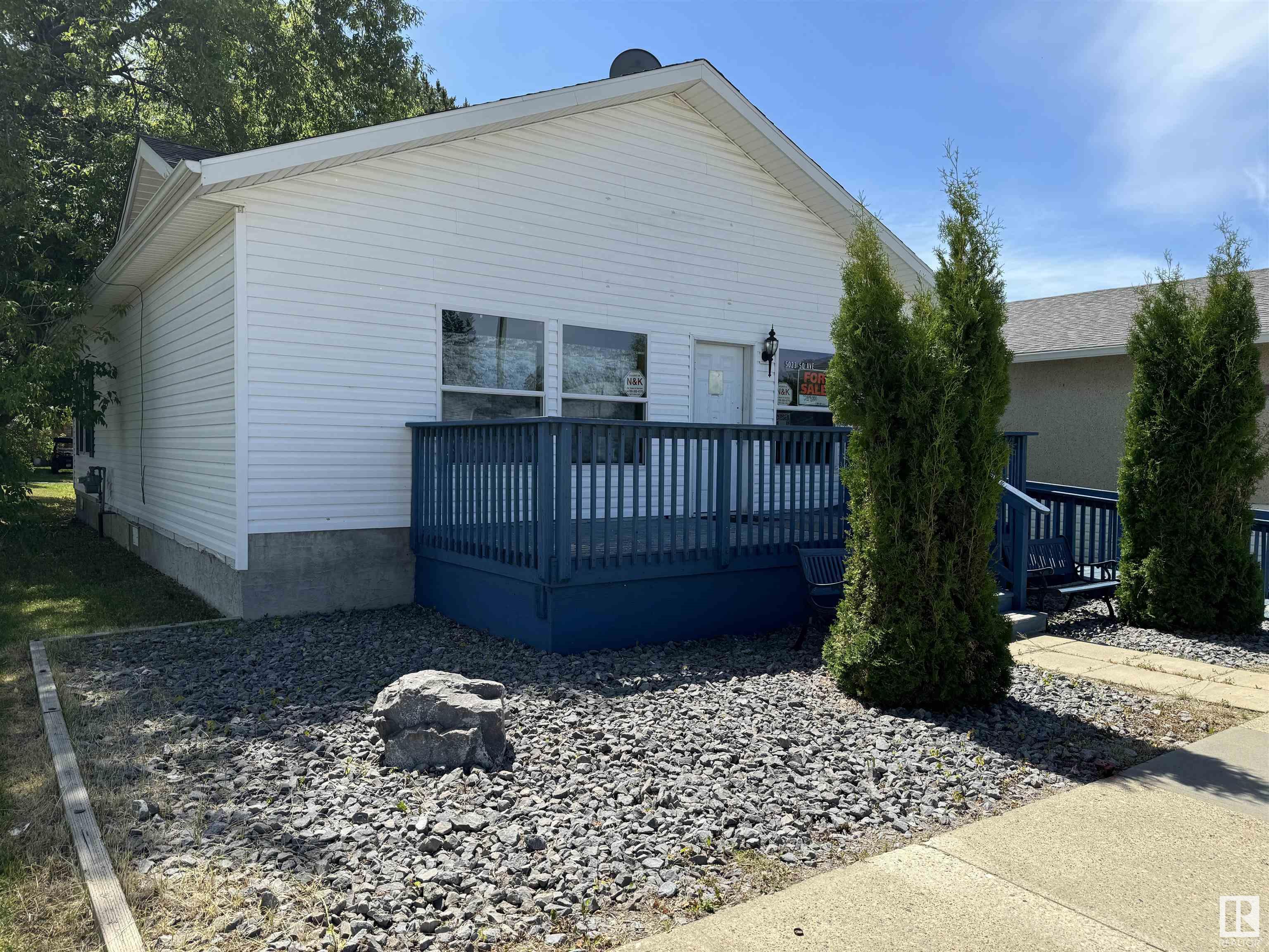 A home for your business! Well cared for office building on main street in Breton, Alberta. Former home to an insurance company and vehicle registry office, this 1296 sq ft office building has attractive street frontage, front deck entry and a side ramp for wheel chair accessibility. Inside is an executive office with bathroom, coffee/break room, bathroom and large front reception and offices area. Included are two desks complete with desk chairs, 4 drawer metal filing cabinet, 3 drawer metal filing cabinet, smaller 2 drawer metal filing cabinet & metal reception chairs. Excluded are all the wooden furniture and detached wooden cabinets. The 40' x 120' lot has rear parking access from back lane.