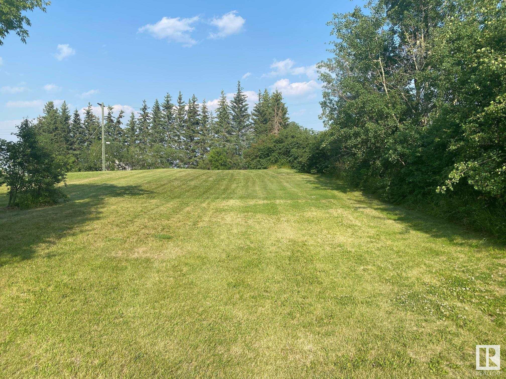 Large 50 x 150 serviced vacant lot in quiet neighborhood in Glendon available immediately.  Zoned R2. Property previously had a house on it that was removed. This is a very attractive building site, with mature trees.
