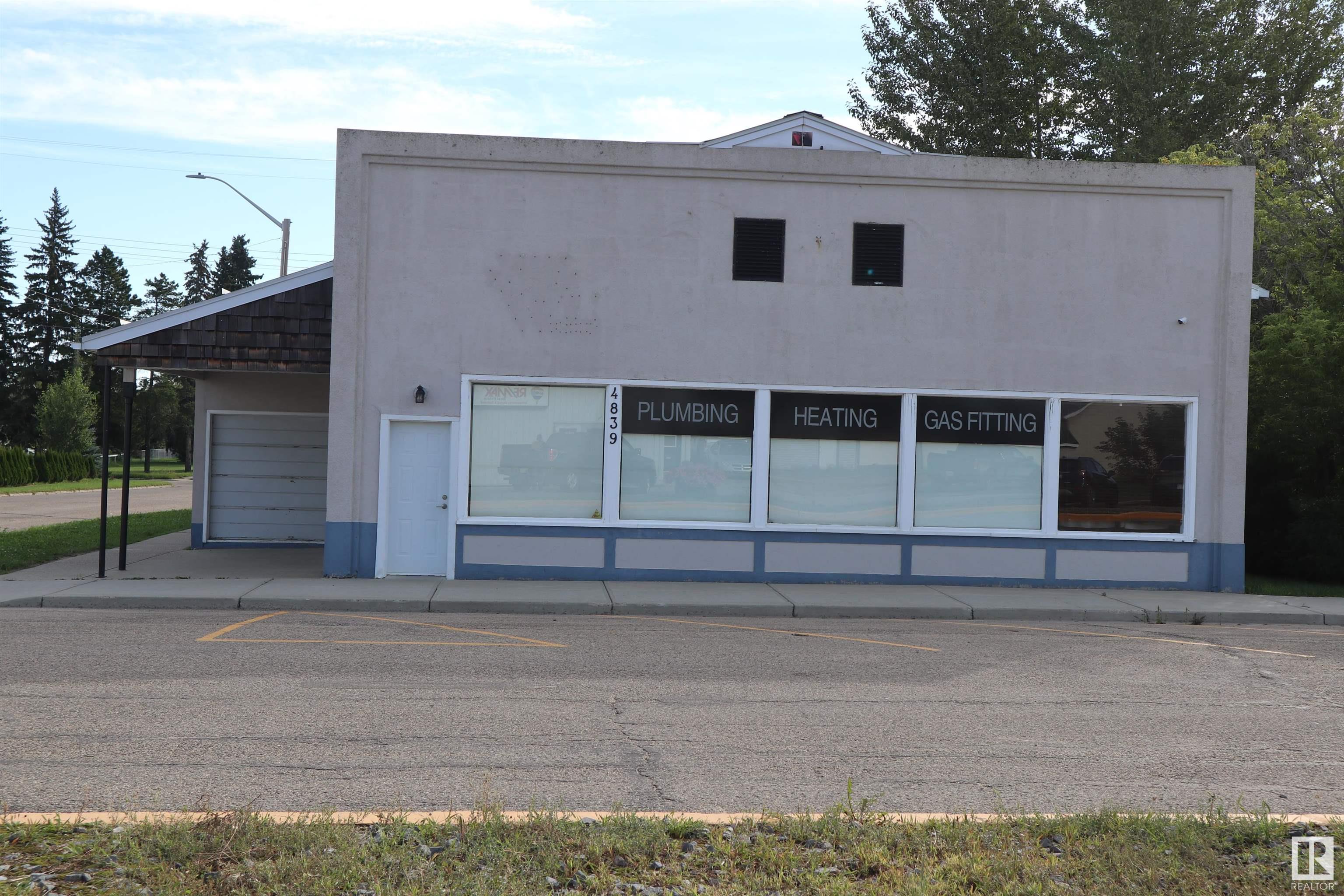 Commercial Building located on Main Street Thorsby. Combination of retail space, work shop, offices, storage, and two washrooms. 3504 sq/ft of heated space perfect for starting your own business or expanding your business to Thorsby. Also has a 666.33 sq/ft addition attached along side not included in the measurements, with an overhead door joining it to the shop space. The shop space also has a 18' wide by 11' tall overhead door at the back and well as more warm and cold storage. Lots of upgrades and updates including a metal roof. All situated on a Corner Lot on Main Street.