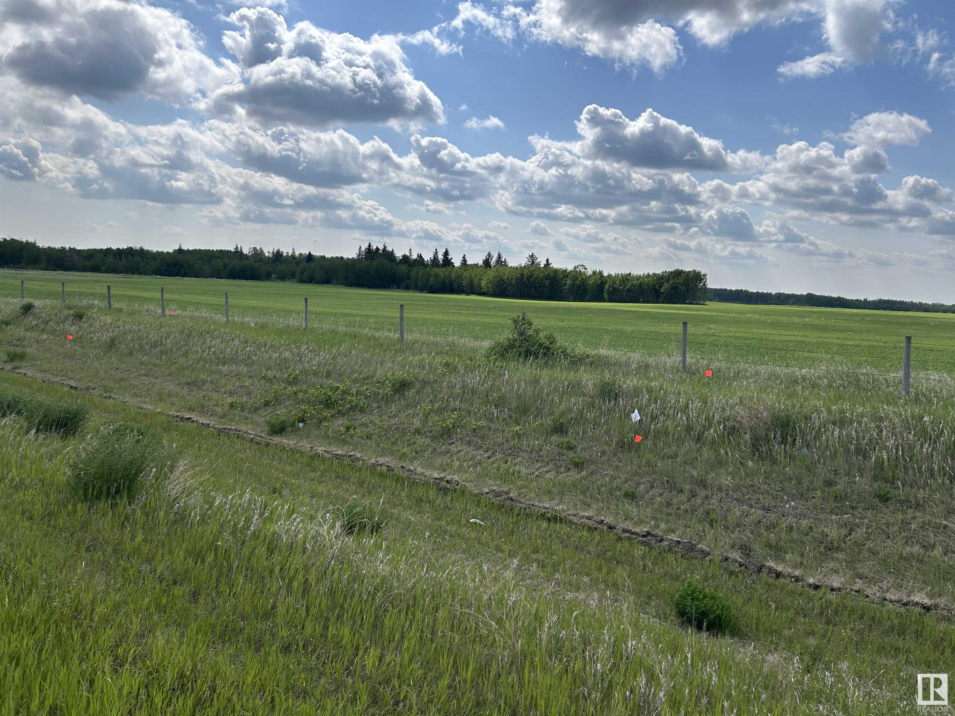 Exceptional opportunity with this 147.5-acre parcel located right on Highway 55 West, boasting outstanding highway exposure and proximity to oil companies. Situated only minutes away from Cold Lake and 4 Wing Back Gate, this prime location experiences high traffic flow. The property features approximately 1500 ft. of Highway 55 frontage, making it an ideal spot for a future venture, whether country residential or industrial (subject to MD of Bonnyville approval). Preliminary soil and groundwater conditions assessments have already been conducted on the property, providing valuable insights for potential development. Additionally, power is conveniently available at the property line, and gas within a close proximity.  Seize this prime location to shape your future venture in a strategically positioned and promising area with excellent visibility and access. GST may be applicable.