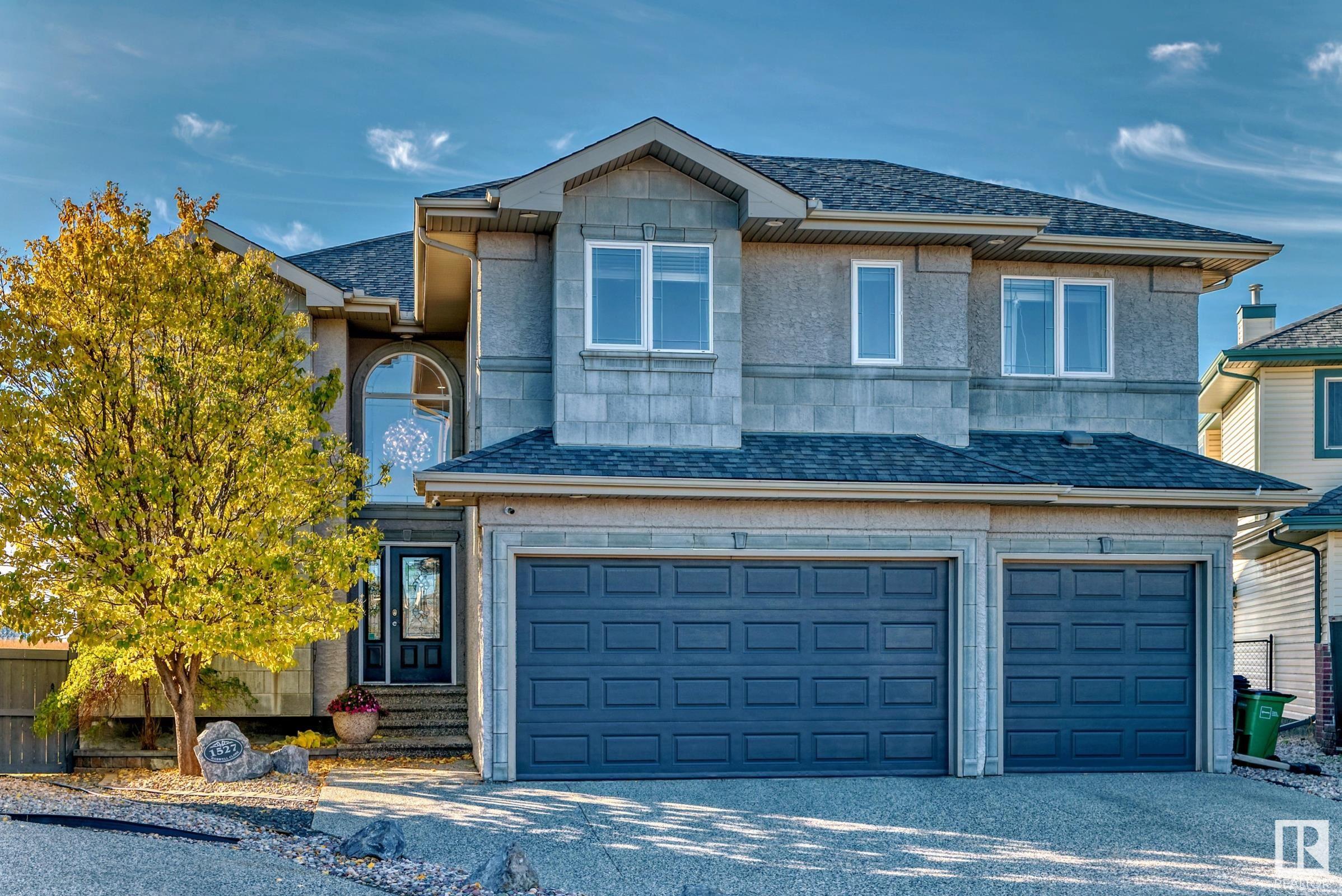 Amazing 3500+ sq. foot home in Riverside backing onto park reserve and drypond.  This 2 storey features a grand foyer, ceramic tile and Mercier red oak hardwood floors throughout the main floor.  The kitchen features custom Kitchen Kraft cabinetry, Cambria quartz countertops and stainless steel appliances.  The large island also features a live edge of quartz on the upper bar seating. Off the kitchen is the expansive deck that comes with metal gazebo complete with LED lighting.  Upstairs features a luxurious primary suite with gorgeous 5pc ensuite and walk in closet and 3 additional bedrooms all with walk in closets and ensuites (one Jack and Jill).The open loft area makes a perfect office space.  Large finished basement comes with finished bar area including 2 TVs and pool table with all accessories, media room complete with theatre seating and 80 inch TV and 3pc bathroom complete with urinal.  Storage room comes complete with 2 high efficiency furnances, new hot water tank and new watersoftner