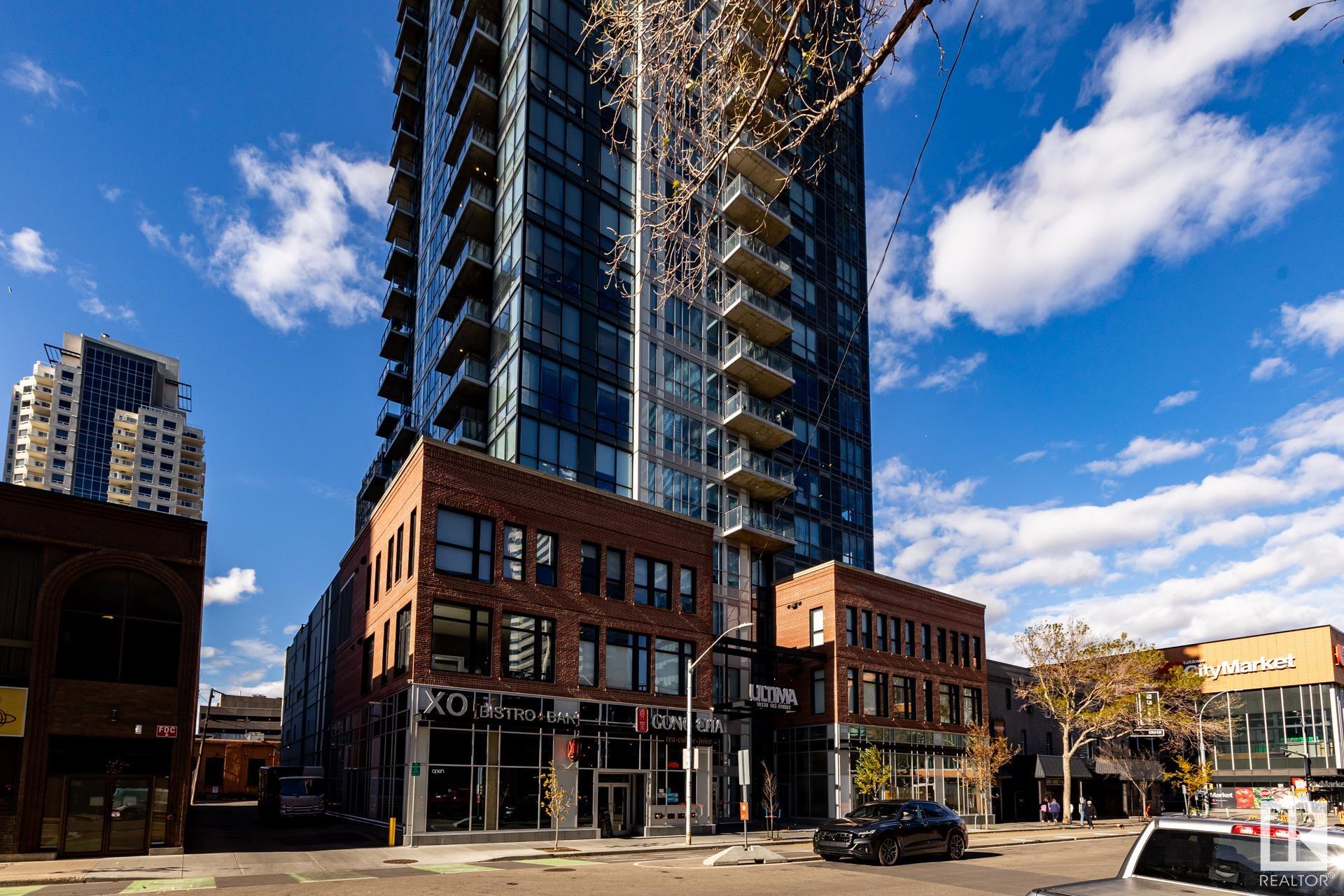 Gorgeous 2-Bedroom + Den Luxury Condo in Downtown Edmonton?s ICE District. This 2-bedroom, 2-bathroom condo with a spacious double-door den is perfect for those who need a workspace at home. The master bedroom suite features a walk-through closet leading to a luxurious 5-piece ensuite with dual sinks, a soaker tub, and a glass-enclosed shower. The second bedroom has a walk-in closet. A large den with double doors provides the perfect space for a home office or guest room. Open-concept kitchen with solid wood cabinetry, quartz countertops, an under-mount sink, and premium stainless steel appliances. Heated underground titled parking stall near the elevator. Titled storage unit included for extra space to meet all your storage needs. Fully equipped fitness centre, Party room,Rooftop patio with a hot tub. Walking distance toRoger?s Place, amazing boutiques/restaurants, Grant Macewan & Farmer's market. Make The Ultima your new home and enjoy the ultimate downtown lifestyle.