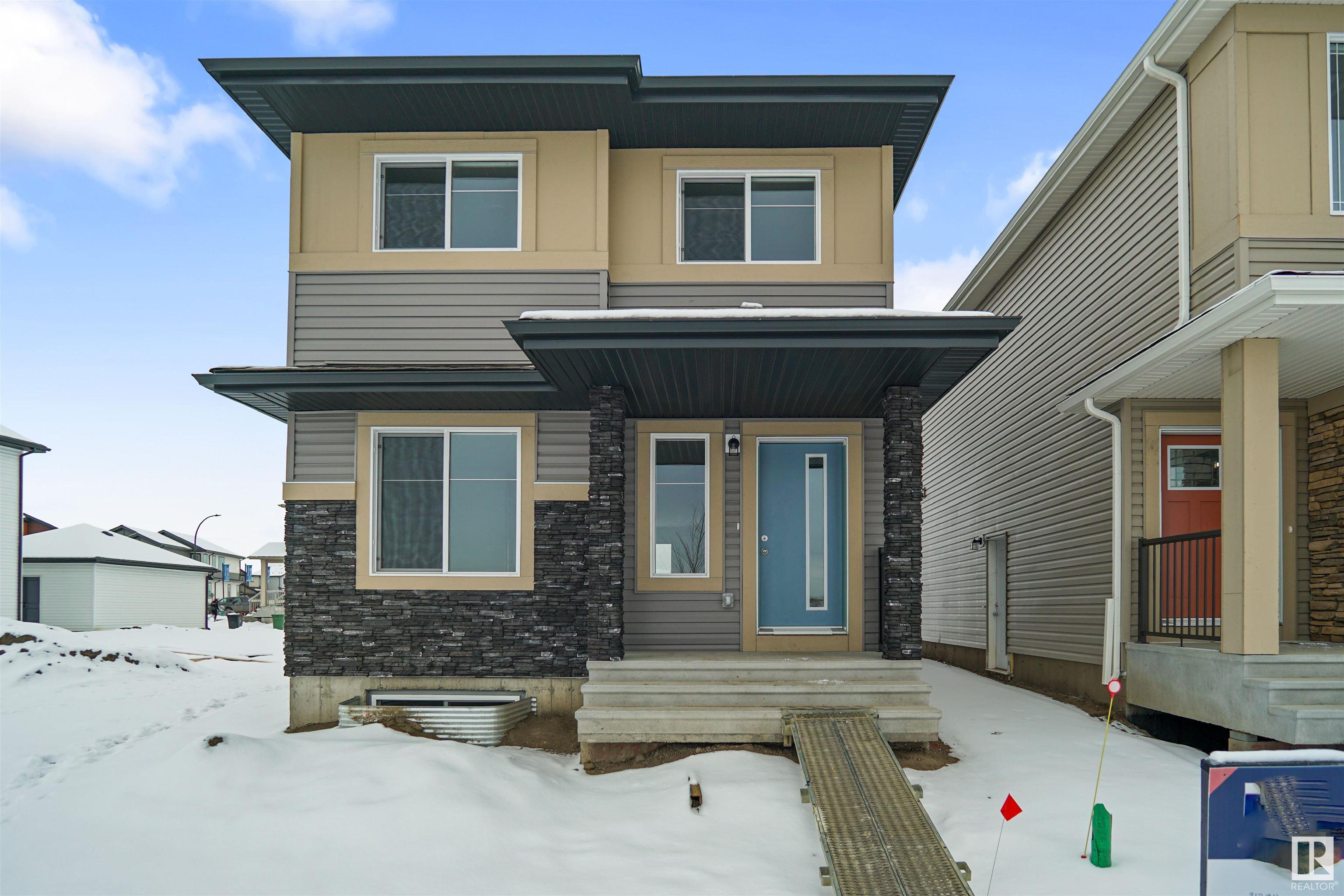Welcome to the "Blackwood" built by the award-winning builder Pacesetter homes and is located in the heart of Jensen Lakes. The Blackwood has an open concept floorplan with plenty of living space. Three bedrooms and two-and-a-half bathrooms are laid out to maximize functionality, allowing for a large upstairs laundry room and sizeable owner?s suite. The main floor showcases a large great room and dining nook leading into the kitchen which has a good deal of cabinet and counter space and also a pantry for extra storage. Close to all amenities and easy access to the Anthony Henday and St Albert Trail. *** Photos are from a previously built home which is the same lay out but the finishing's and colors will vary home is under construction and slated to be completed by April of 2025  ***