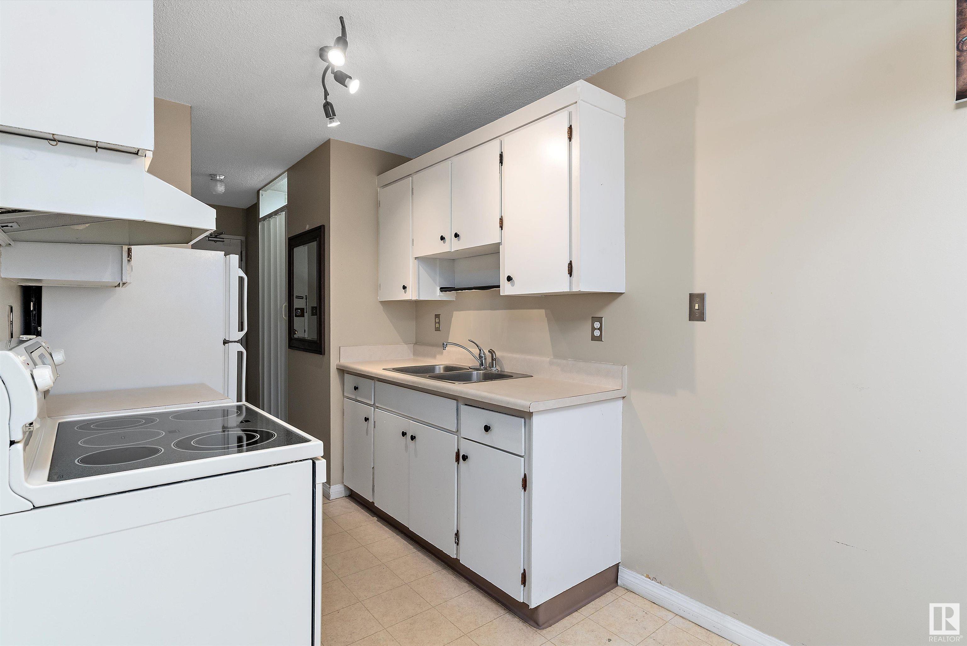      #202 8310 JASPER AV NW , Edmonton,  ,T5H 3S3 ;  Listing Number: MLS E4414598