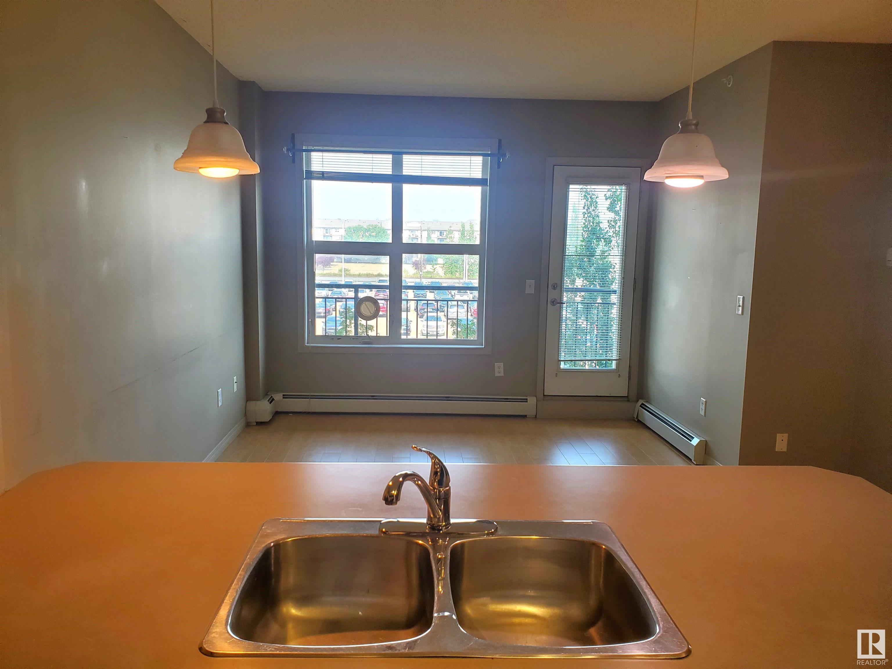      #1-311 4245 139 AV NW , Edmonton,  ,T5Y 3E8 ;  Listing Number: MLS E4415067