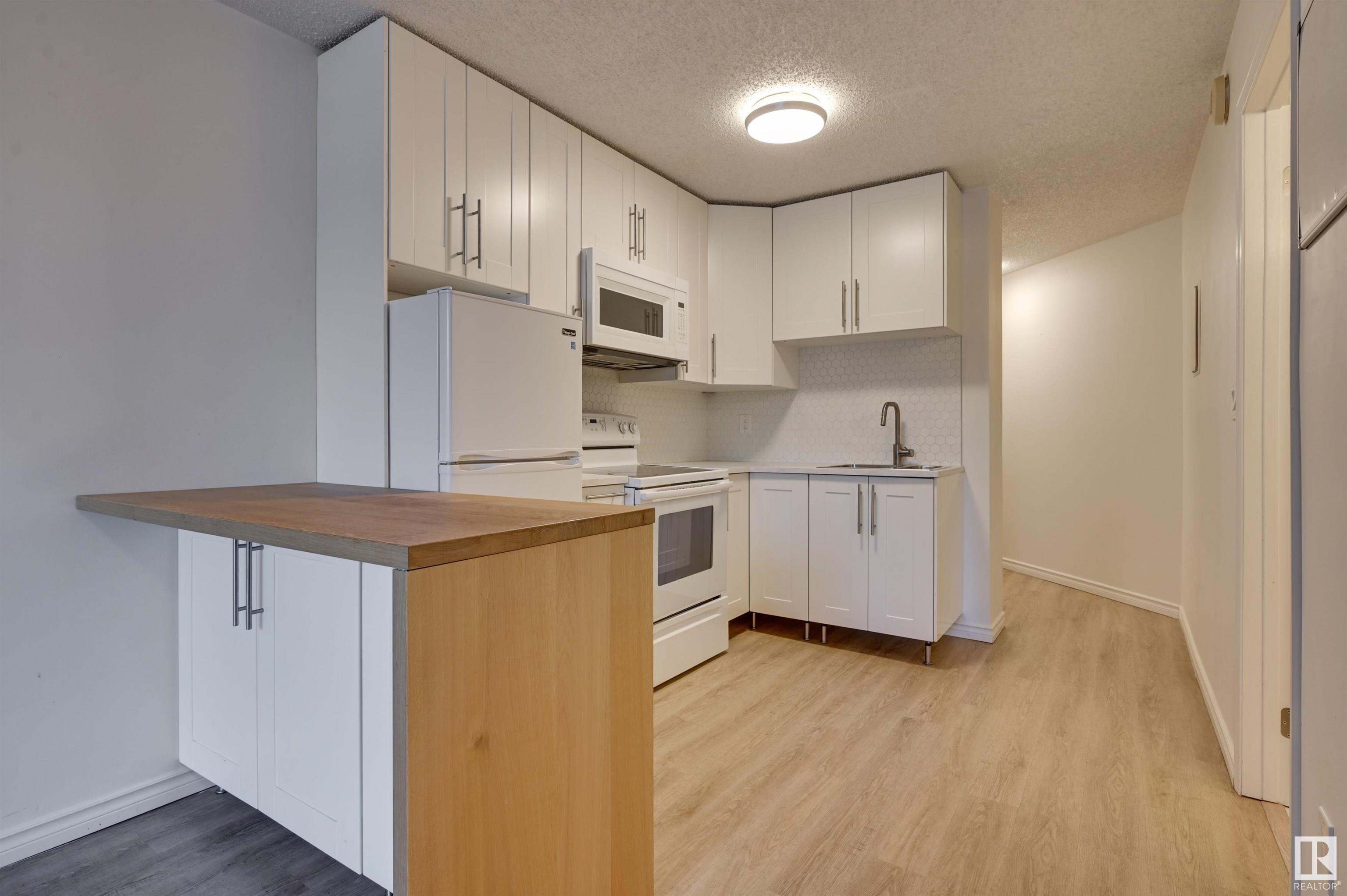      #203 11503 100 AV NW , Edmonton,  ,T5K 2K7 ;  Listing Number: MLS E4415533