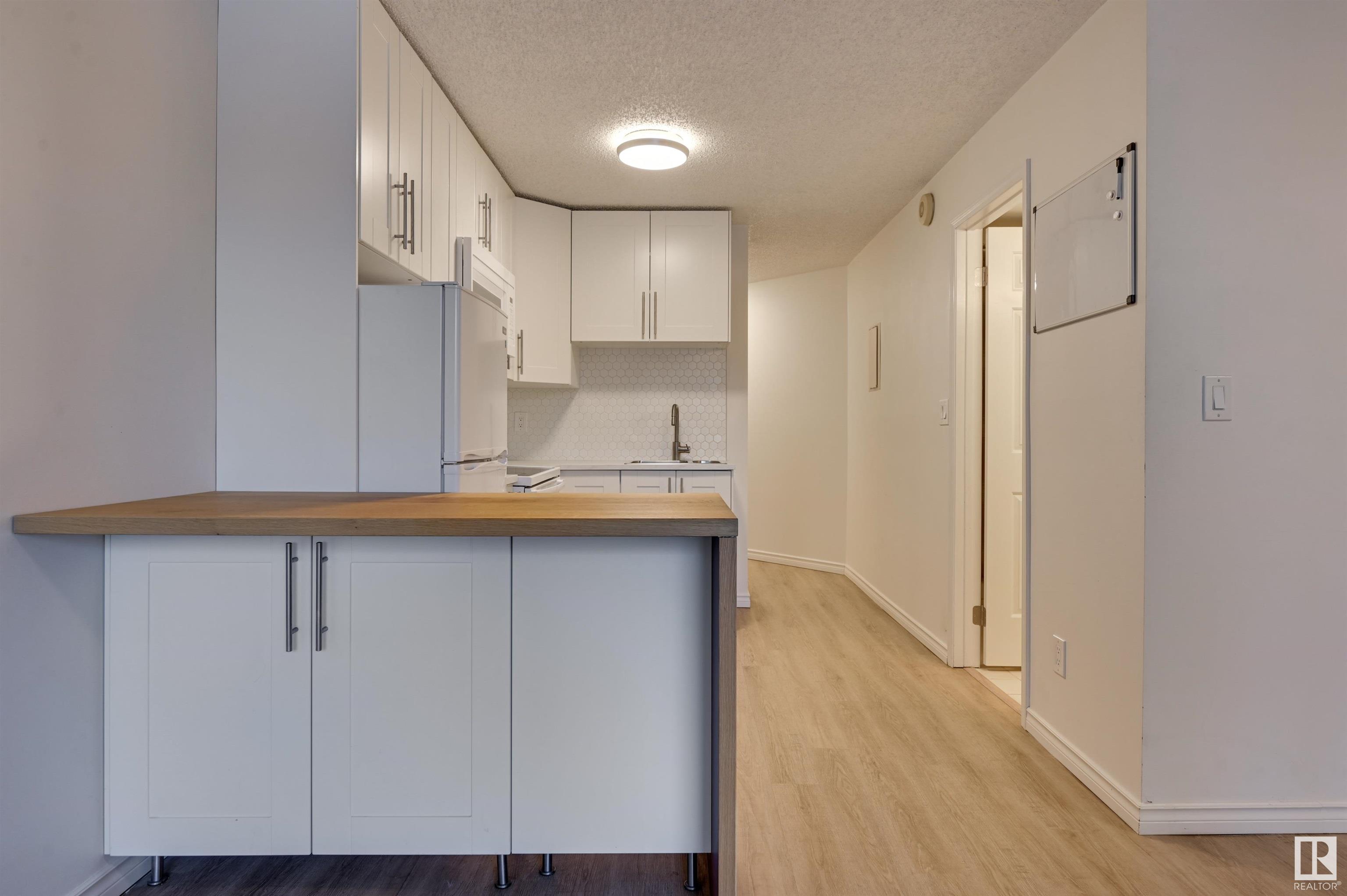      #203 11503 100 AV NW , Edmonton,  ,T5K 2K7 ;  Listing Number: MLS E4415533