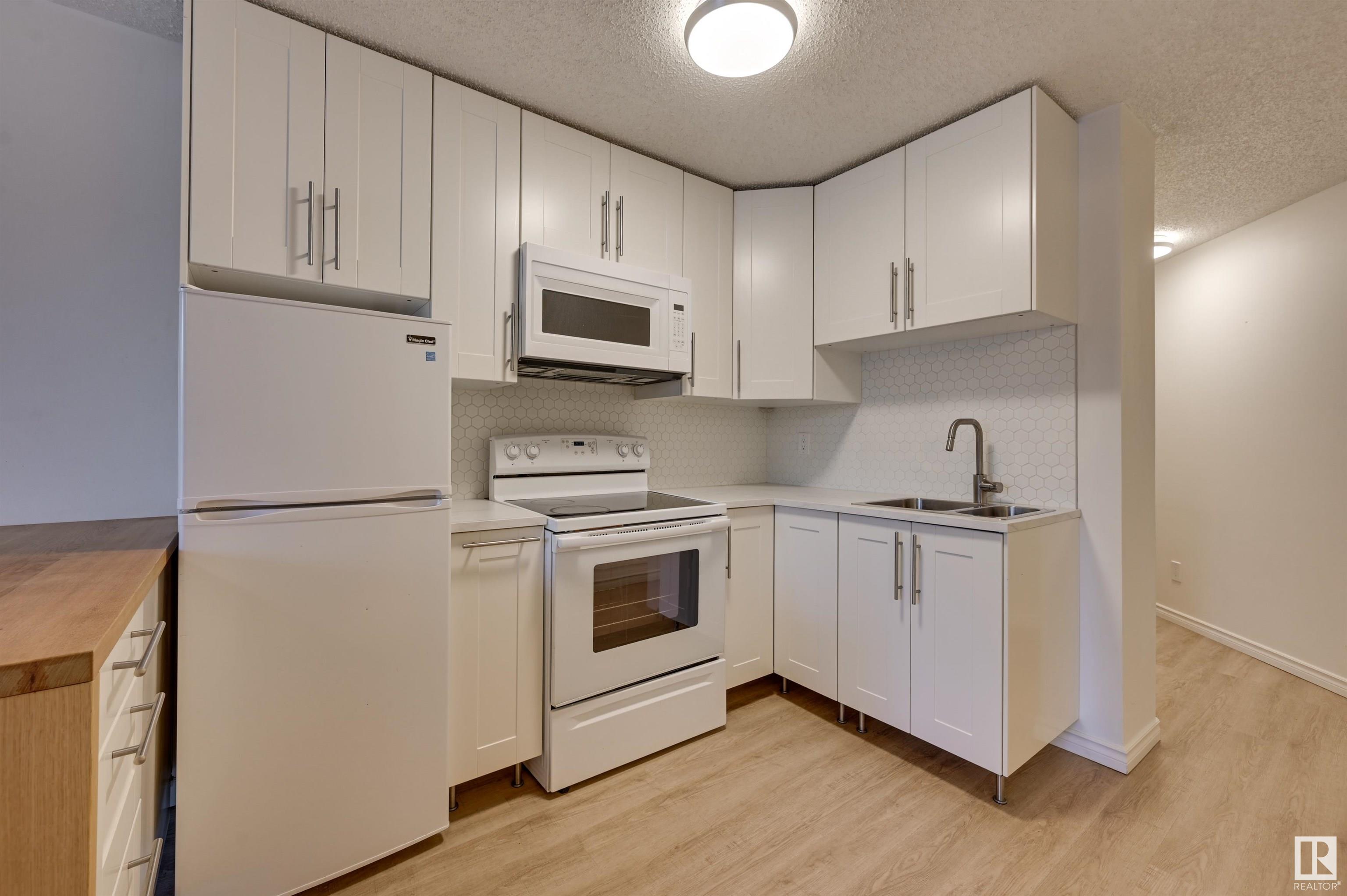      #203 11503 100 AV NW , Edmonton,  ,T5K 2K7 ;  Listing Number: MLS E4415533