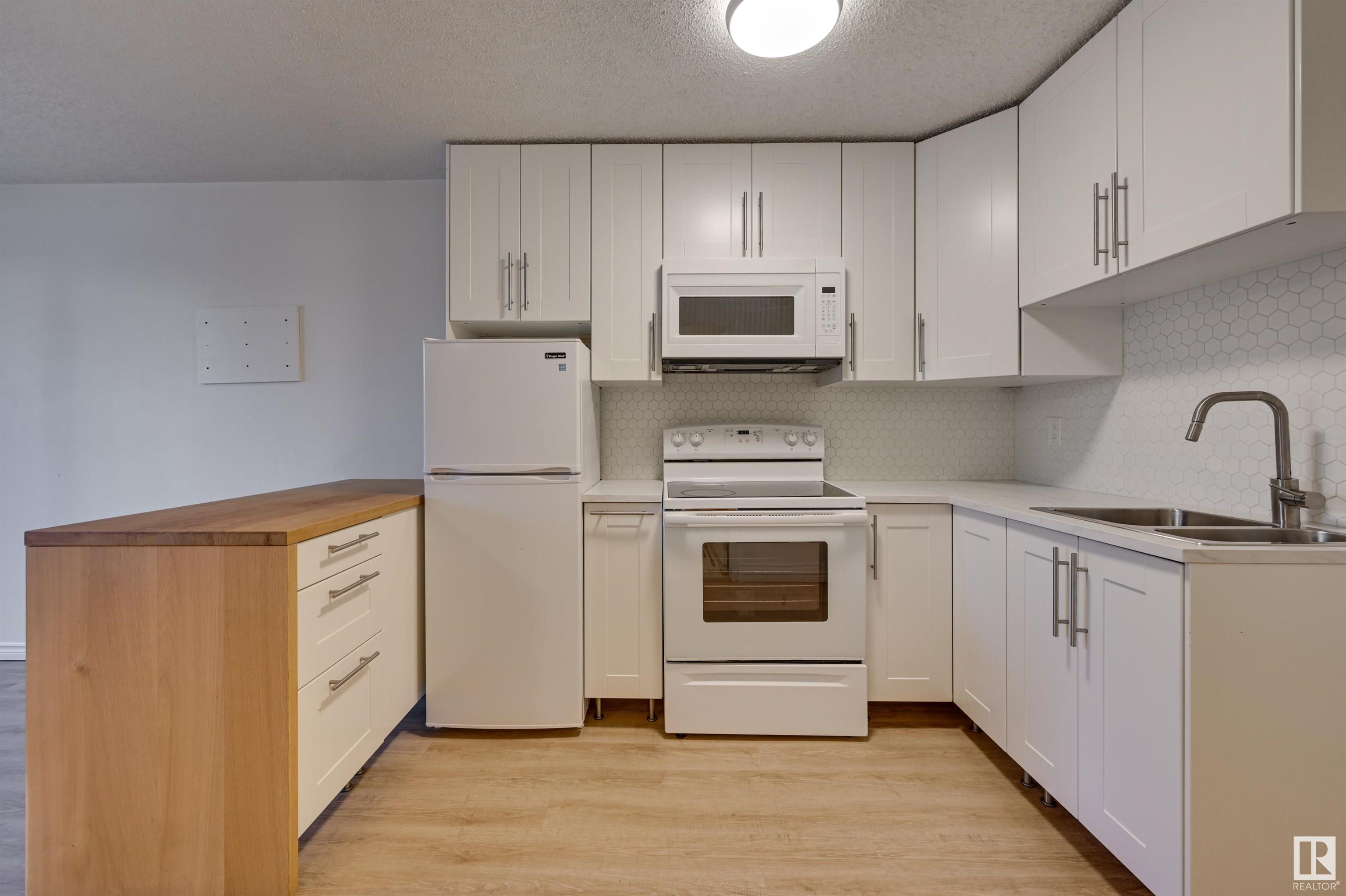      #203 11503 100 AV NW , Edmonton,  ,T5K 2K7 ;  Listing Number: MLS E4415533