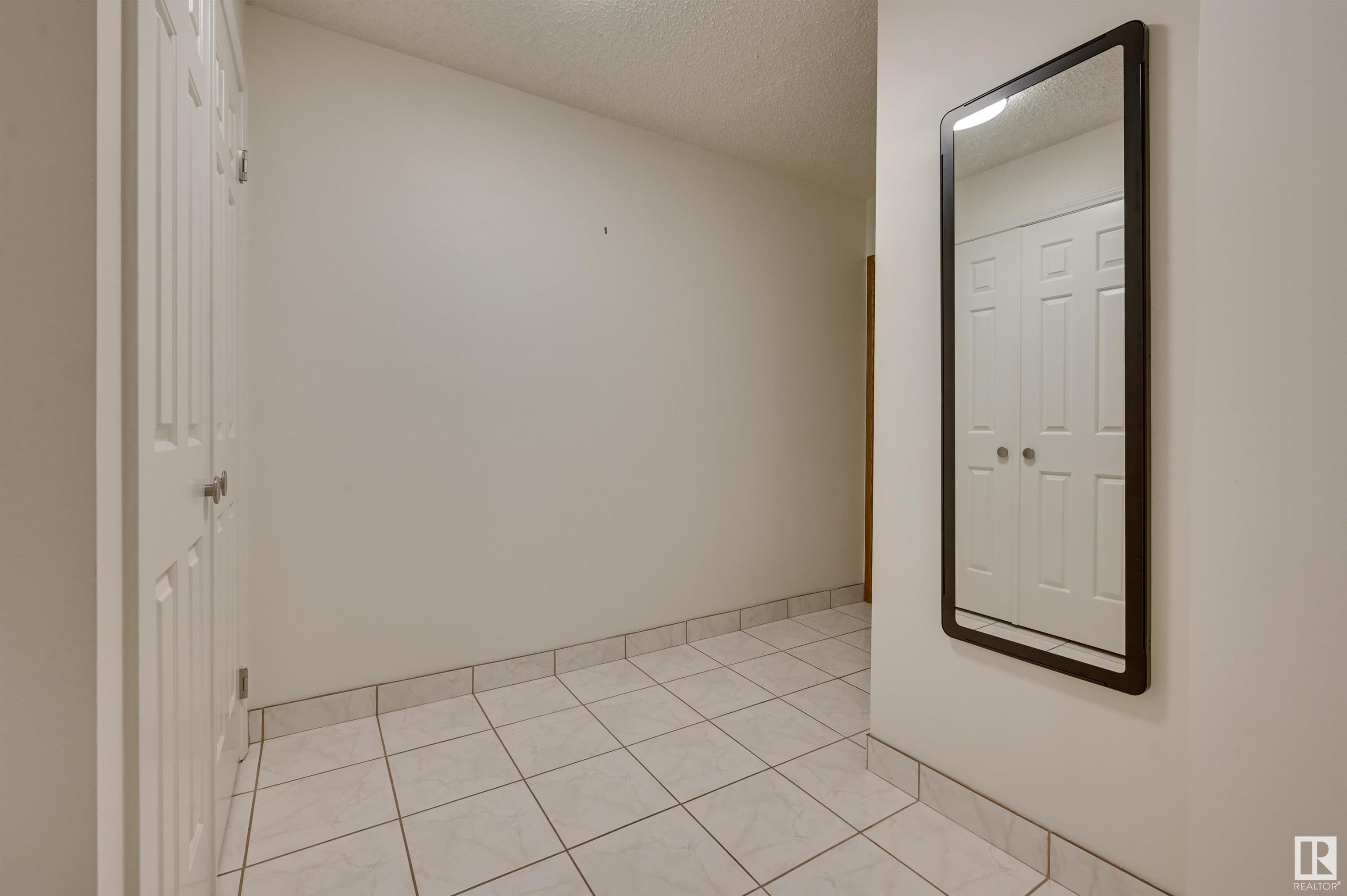      #203 11503 100 AV NW , Edmonton,  ,T5K 2K7 ;  Listing Number: MLS E4415533