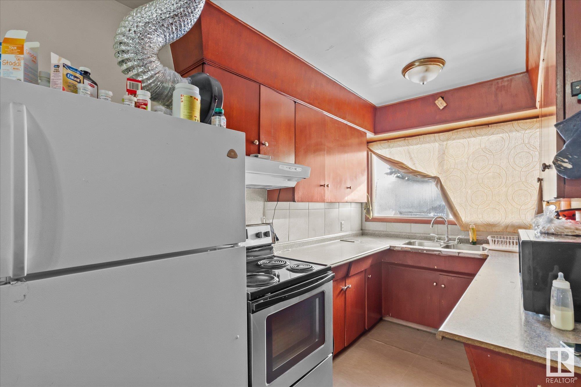      #9503-9505-9507 9509-9511 9513 129B AV NW , Edmonton,  ,T5E 0P7 ;  Listing Number: MLS E4415607
