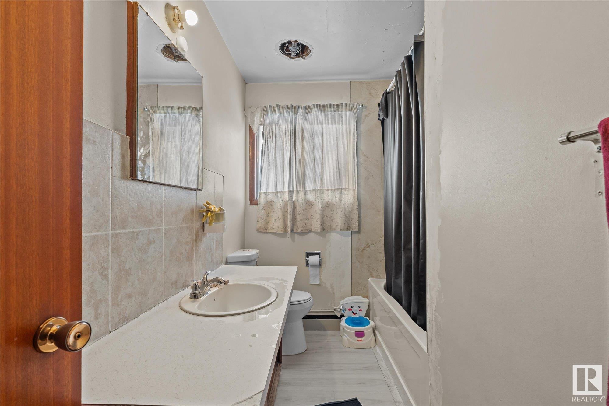      #9503-9505-9507 9509-9511 9513 129B AV NW , Edmonton,  ,T5E 0P7 ;  Listing Number: MLS E4415607