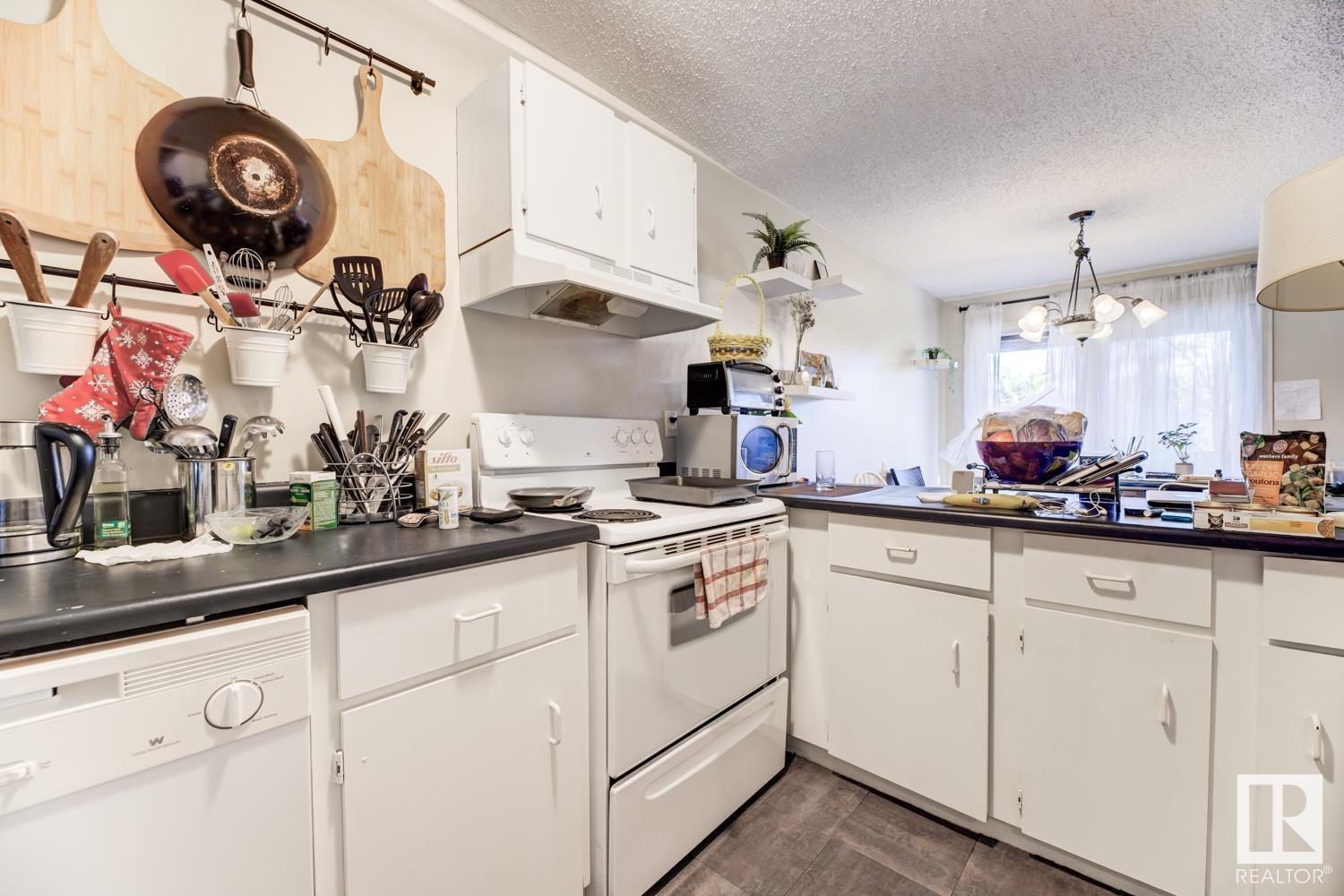      #201 7915 112 AV NW , Edmonton,  ,T5B 0E7 ;  Listing Number: MLS E4415876