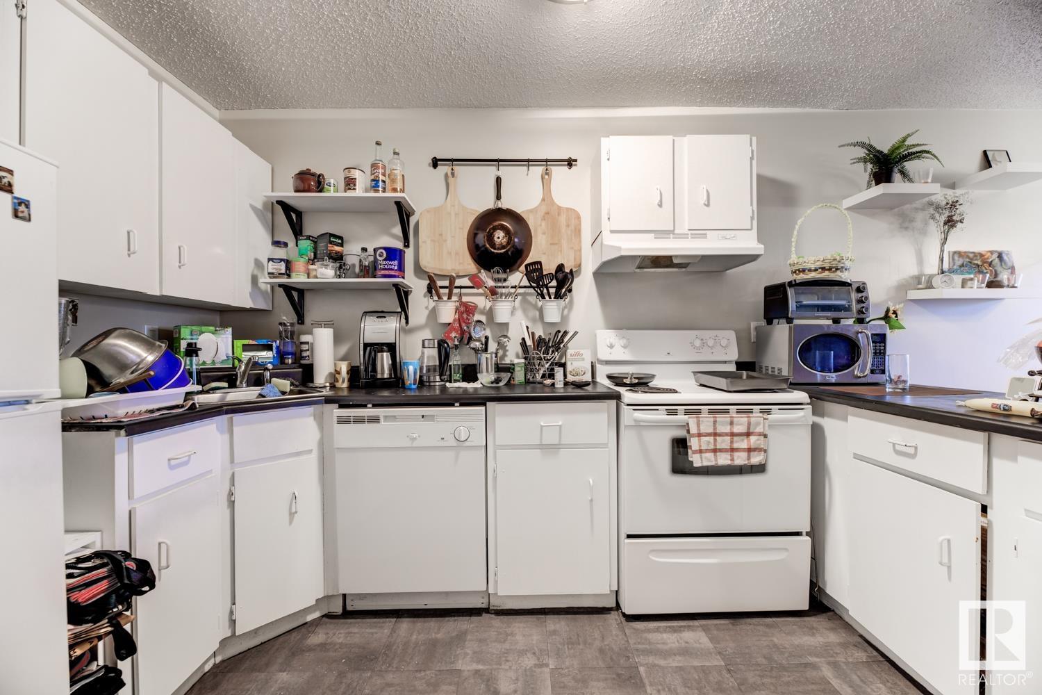      #201 7915 112 AV NW , Edmonton,  ,T5B 0E7 ;  Listing Number: MLS E4415876