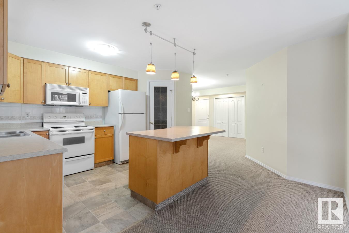      #210 8909 100 ST NW , Edmonton,  ,T6E 6T4 ;  Listing Number: MLS E4415911