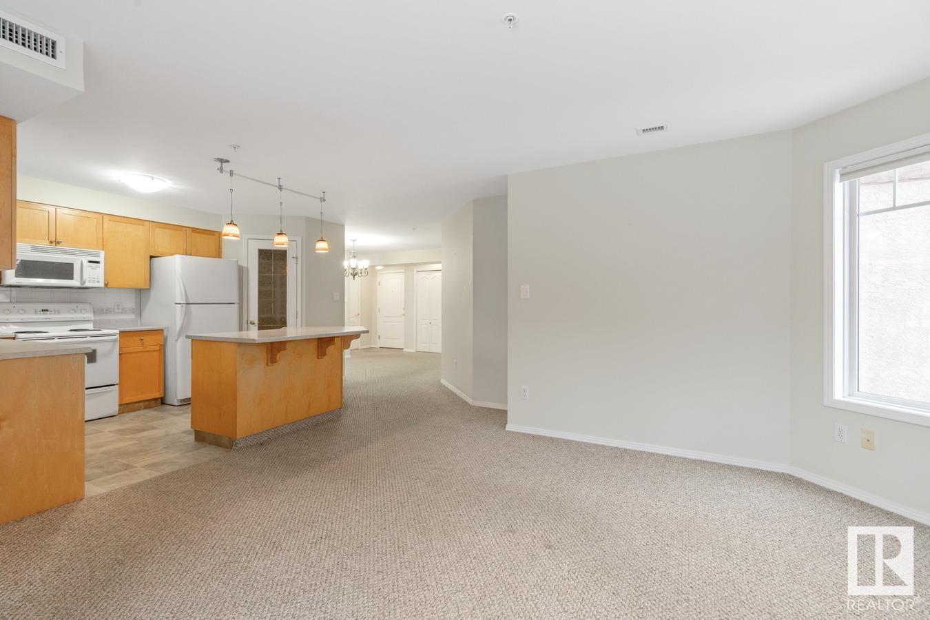      #210 8909 100 ST NW , Edmonton,  ,T6E 6T4 ;  Listing Number: MLS E4415911