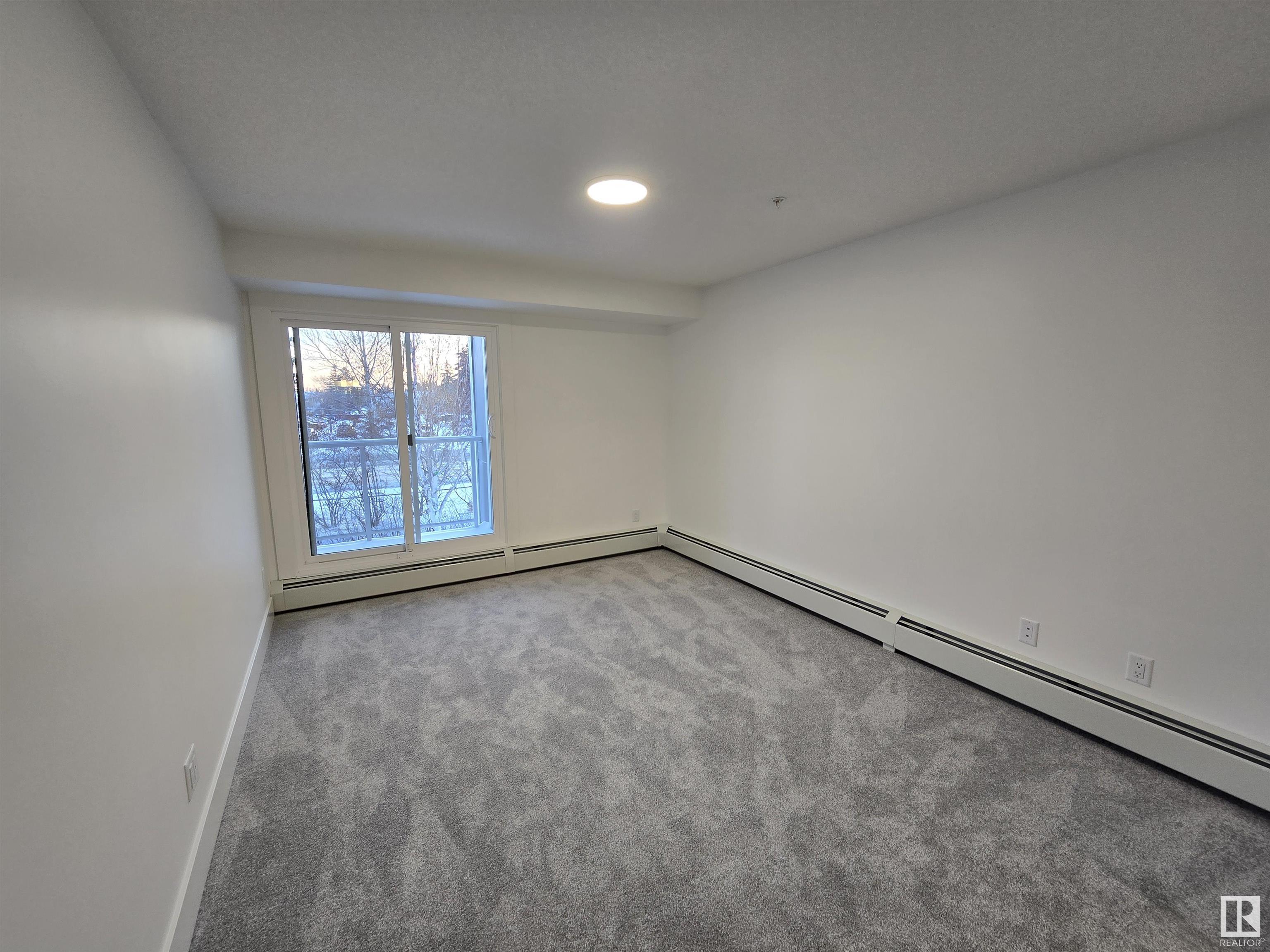      #205 9504 182 ST NW , Edmonton,  ,T5T 3A7 ;  Listing Number: MLS E4416509
