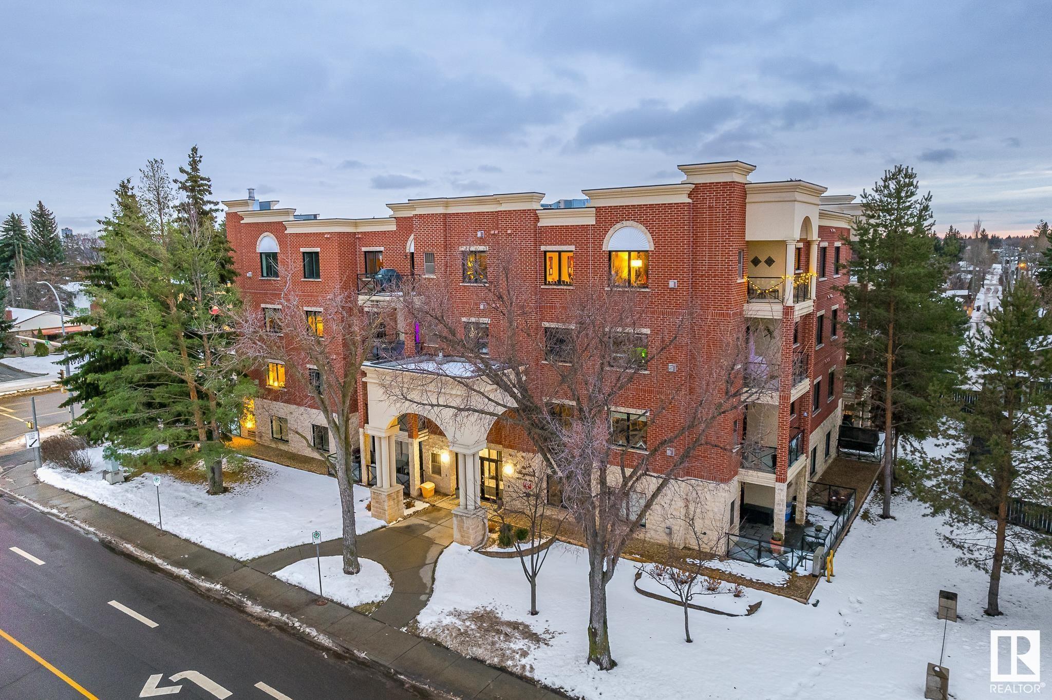 Elegant corner unit in Crestwood!  Classic brick exterior on top of concrete and steel construction is excellent for soundproofing and peace and quiet. This is one of the three largest units in the building. The open floorplan features 2 bedrooms plus a den/office.  When you walk in you will notice the abundant natural light and 9 foot ceilings.  The spacious living room with corner gas fireplace that also leads to a covered balcony. The cook in the family will love the gourmet kitchen with granite, stainless steel appliances, gas stove (electric hookup also available), and island. The master bedroom features a walk in closet and full ensuite with double sinks.  In suite laundry is nicely equipped with Samsung washer and dryer. Other features include a  main bathroom with a  walk in shower.  Numerous extras include A/C crown moulding and pot lights. All of this in a perfect location walking distance to shopping and the river valley. 2 titled underground parking stalls and a storage locker.