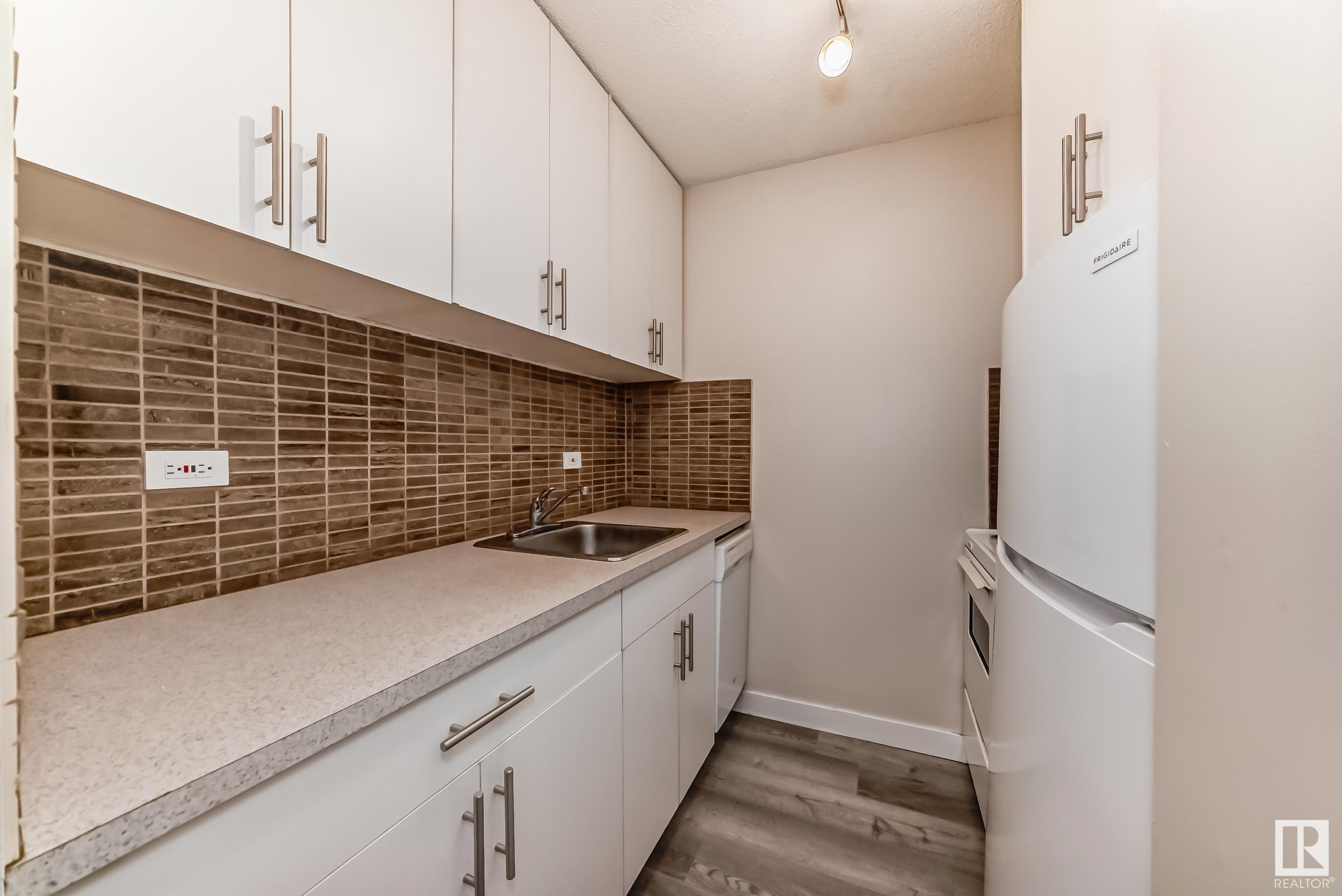      #206 10140 120 ST NW , Edmonton,  ,T5K 1Z8 ;  Listing Number: MLS E4417480