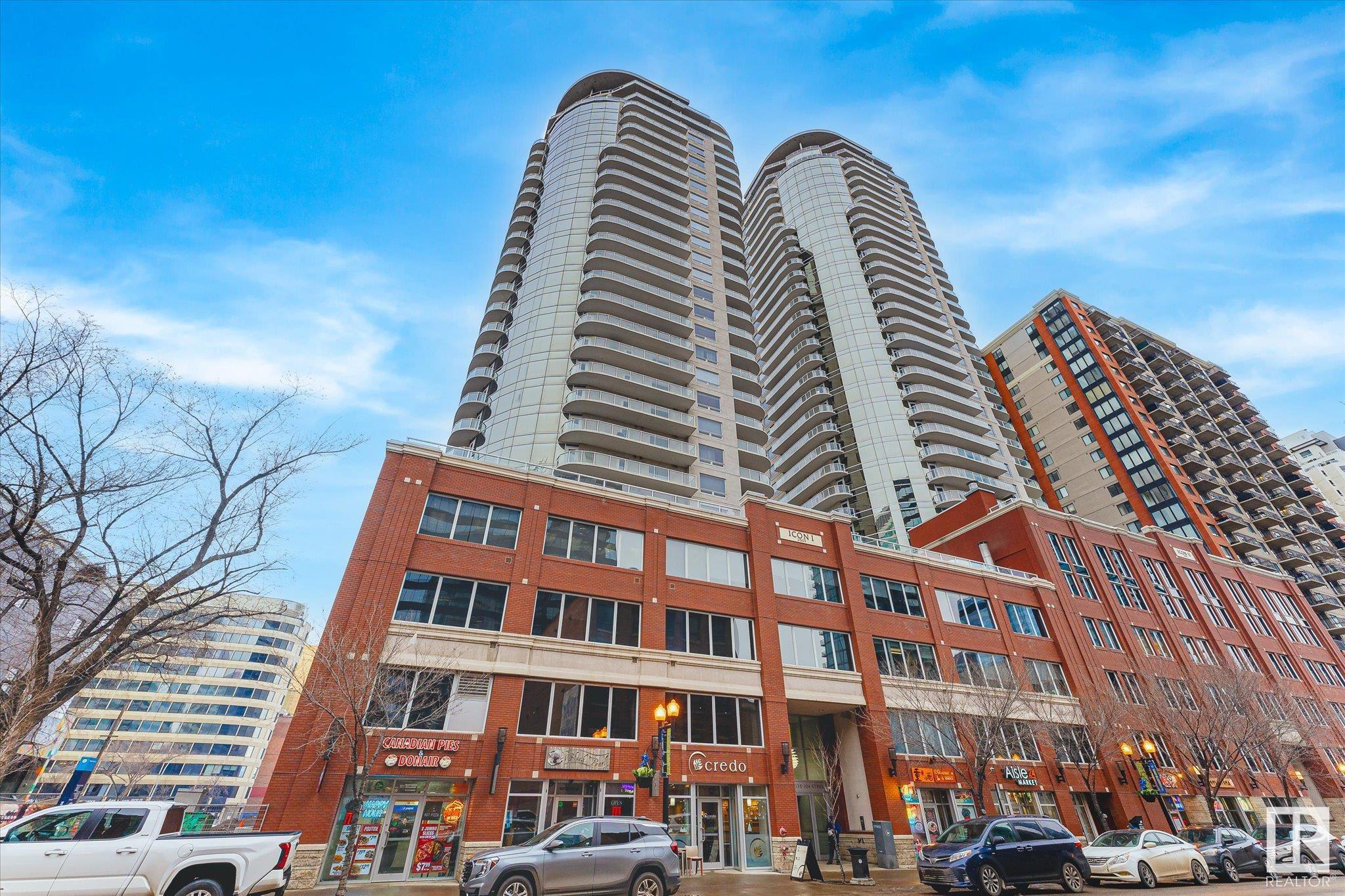 Spectacular full view of Downtown Edmonton and Roger's Place. This spacious 2 bedroom and 2 bath home has many features that include: 9 foot ceilings, renovated 2 tone kitchen with quartz counters and equipped w/ Stainless Steel appliances, open bright floor plan with great flow, two large bedrooms, upgraded luxury vinyl plank (3 months old), walk-in closet, lots of storage, and a balcony with gas line. As for the location, you will find a grocery store, LRT, locally owned shops, cafes and restaurants just steps away.  Arts, Museum, Theatre, the Winspear, all steps away. Plus the River Valley is within walking distance and minutes away. The LRT connects  you in minutes to the U of A, and NAIT, walk to Grant MacEwan. Enjoy Edmonton's Downtown Farmer's Market Saturdays from May to Oct right out your front door. Located in the sought after 104 Street Warehouse District; one of Edmonton's best streets with a WALK SCORE of 98/100, recognized as one of Canada's top Streets.