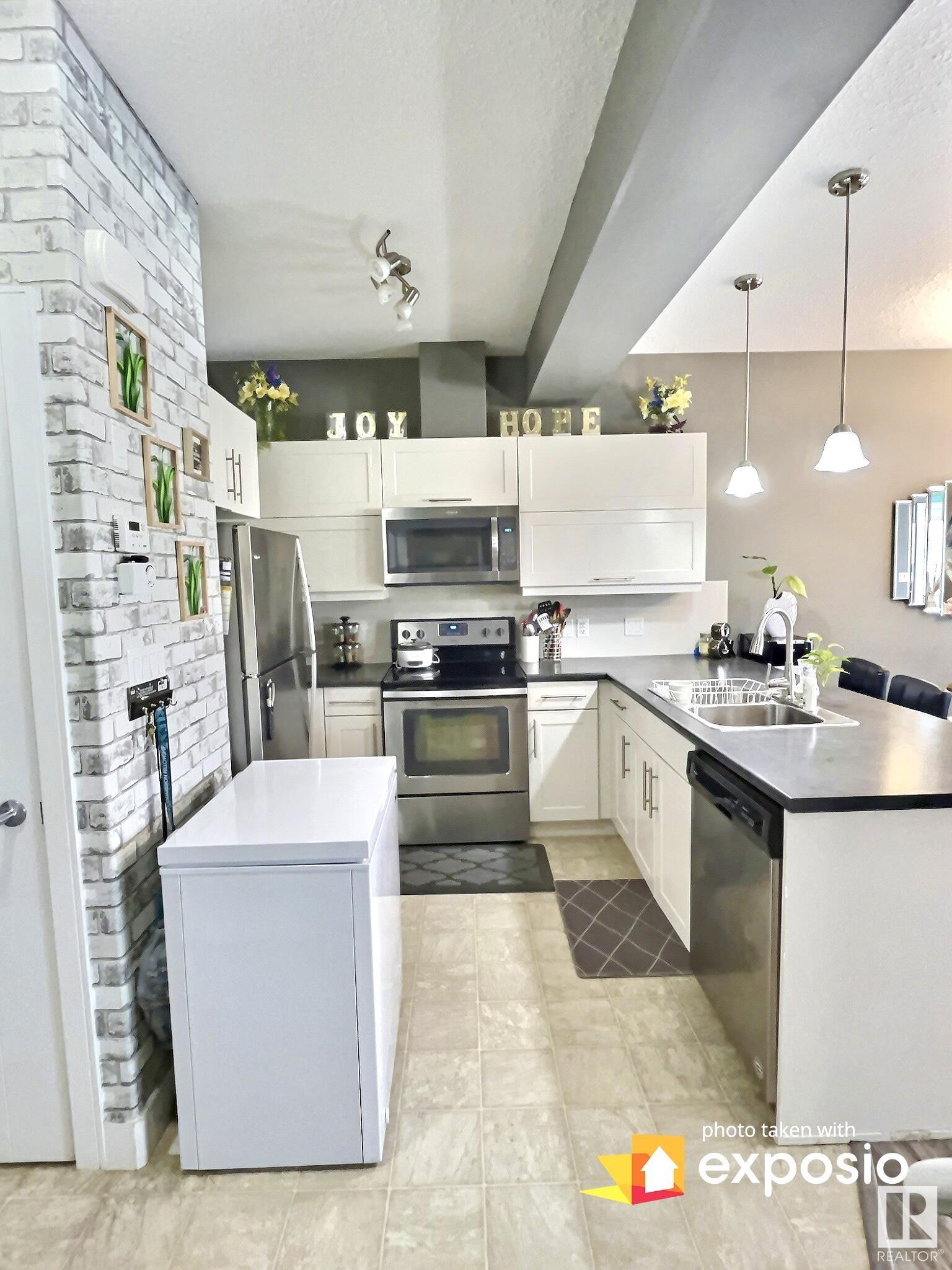 Photo 8 at 13039 132 Avenue NW, Athlone, Edmonton