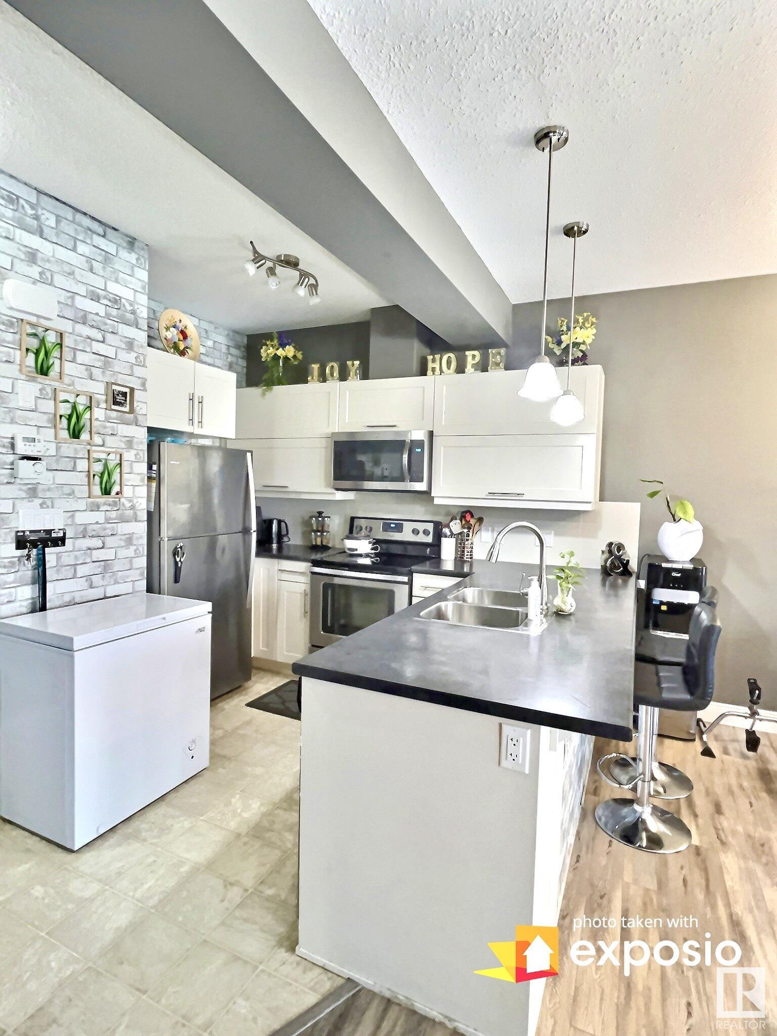 Photo 10 at 13039 132 Avenue NW, Athlone, Edmonton