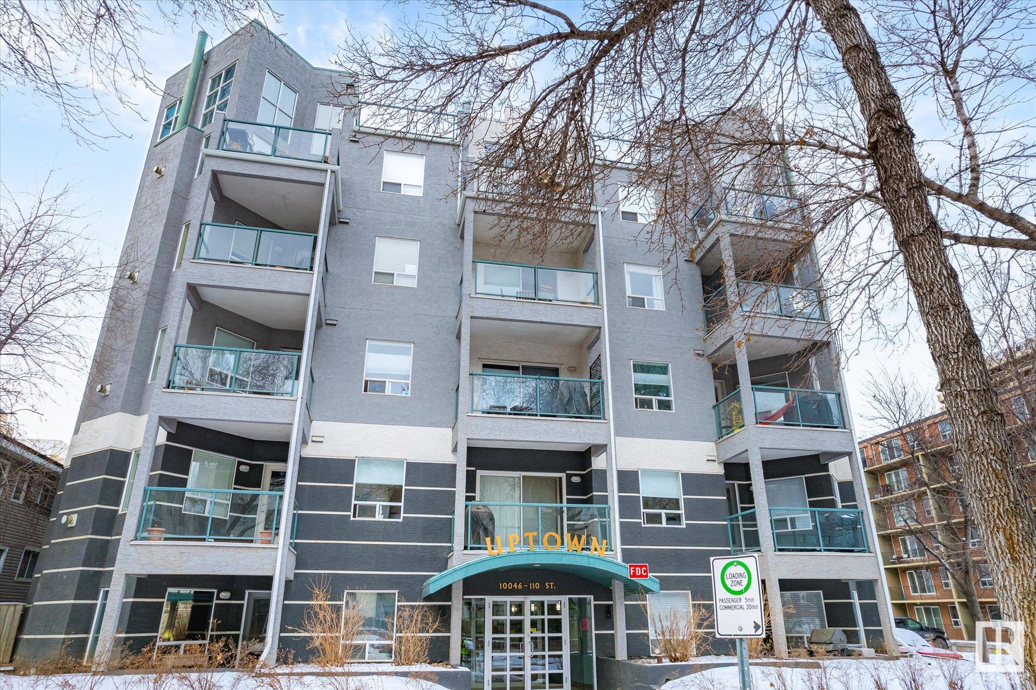 Not many units come up for sale in this popular building! Located in the ultra convenient Grandin area of Oliver which is one of Edmonton's most sought after communities. Centrally located, you are within one block of a grocery store, the LRT (light rail transit) Government Centre stop, restaurants, the river valley trail system, and so much more! Excellent setup for students with University of Alberta, Grant MacEwan and NAIT easily accessible by public transit. This open plan 2 bedroom, 2 bathroom unit is perfect for room mates with tons of storage space, in-suite laundry,  balcony with natural gas hook up. The interior has a spacious feel with 9 foot ceilings and includes upgraded finishes such as in floor heating, ceramic tile flooring, newer carpet (2023), Hunter Douglas blinds, and a gas fireplace. The unit also includes a titled heated underground parking stall (#44).  Quick possession is available.