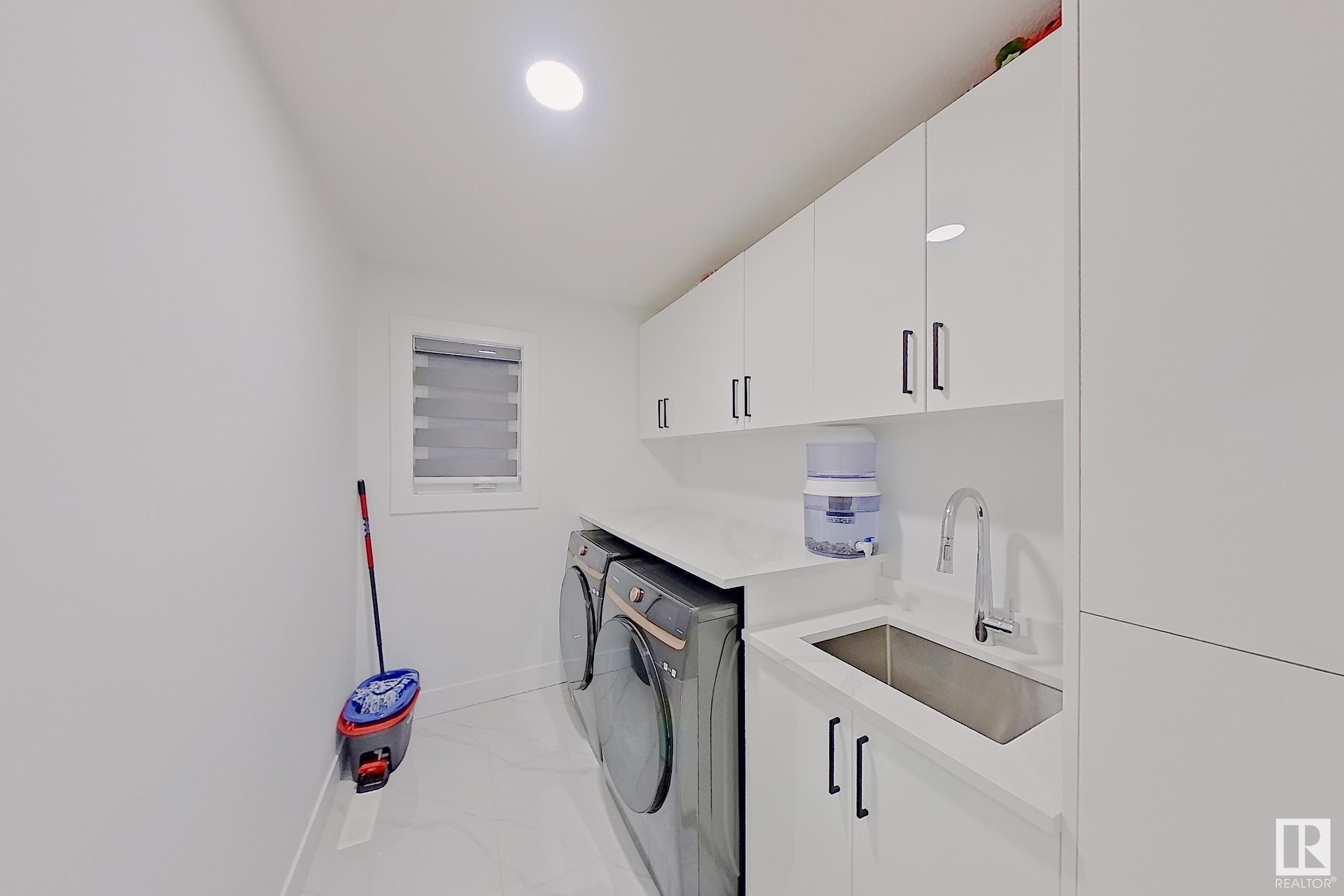      1027 151 AV NW NW , Edmonton,  ,T5Y 4C8 ;  Listing Number: MLS E4418562
