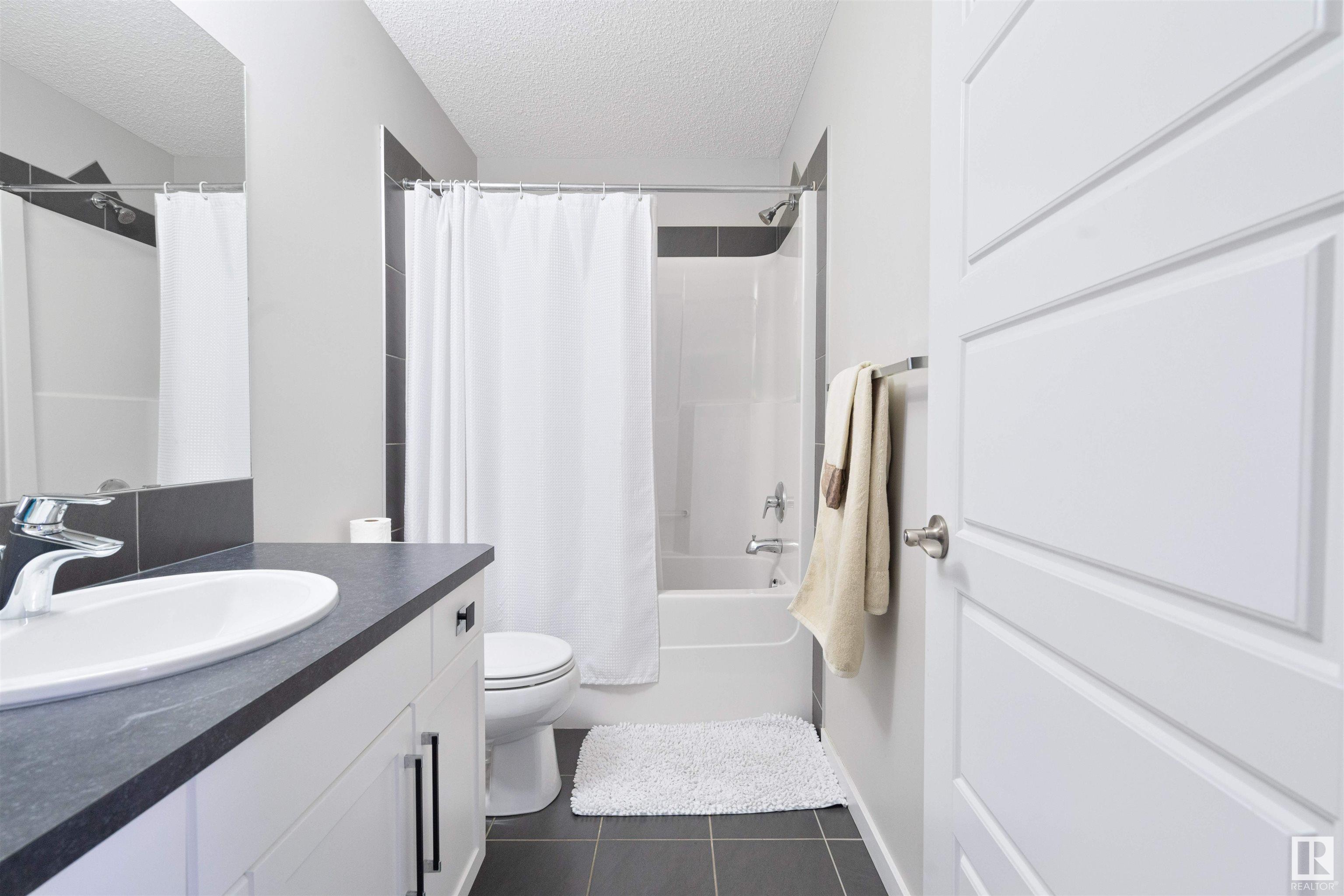 Photo 18 at 703 Secord Boulevard Nw, Secord, Edmonton