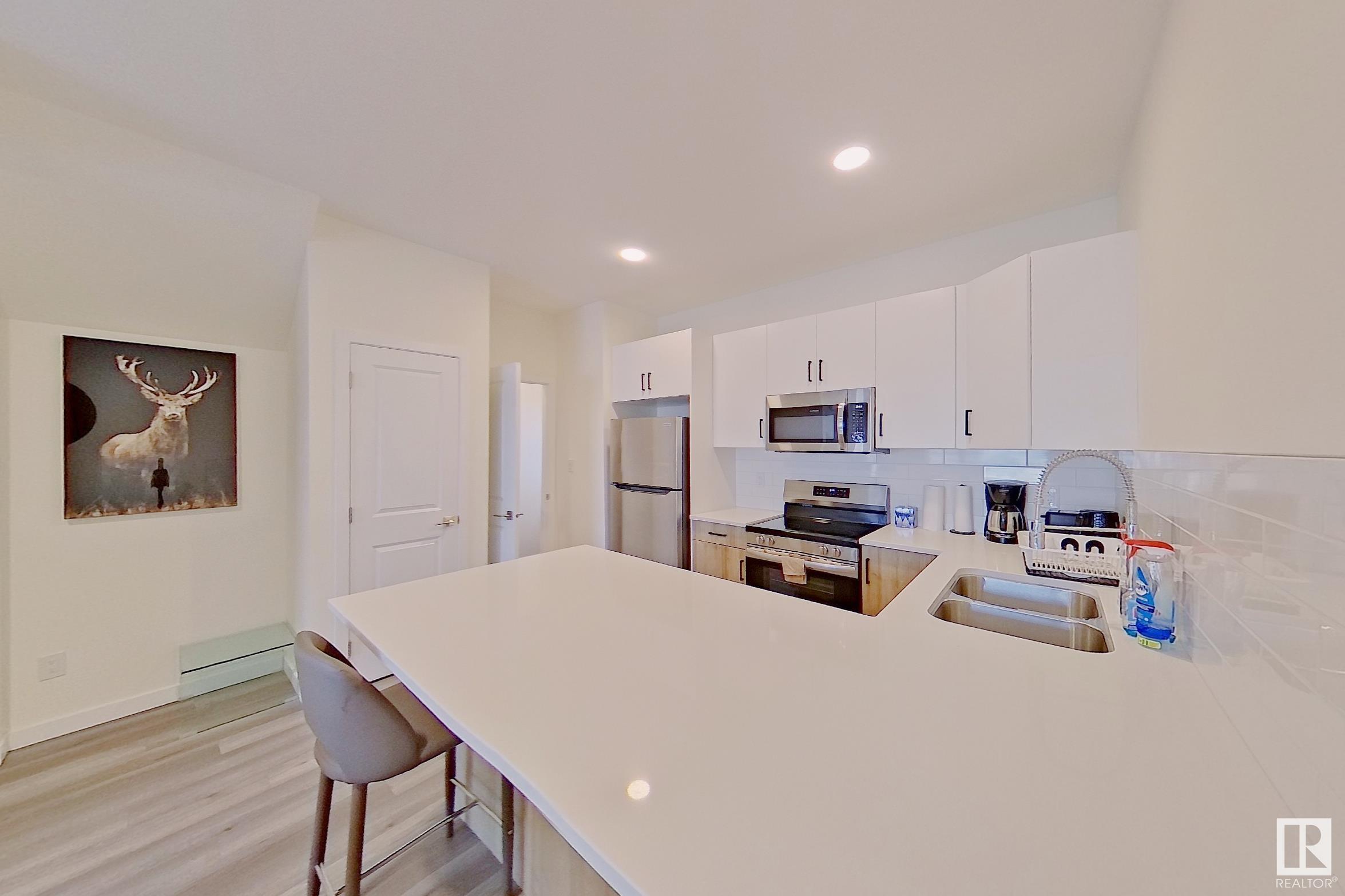      8003-5,7,9 120 AV NW , Edmonton,  ,T5B 2N7 ;  Listing Number: MLS E4420020