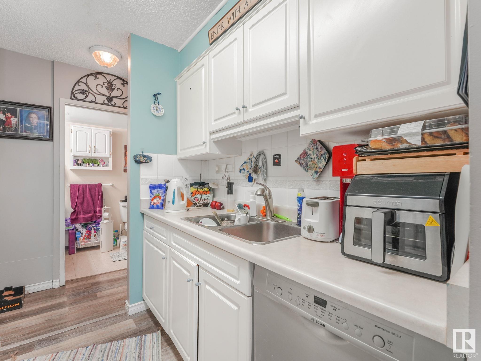      #210 13910 STONY PLAIN RD NW , Edmonton,  ,T5N 3R2 ;  Listing Number: MLS E4420087