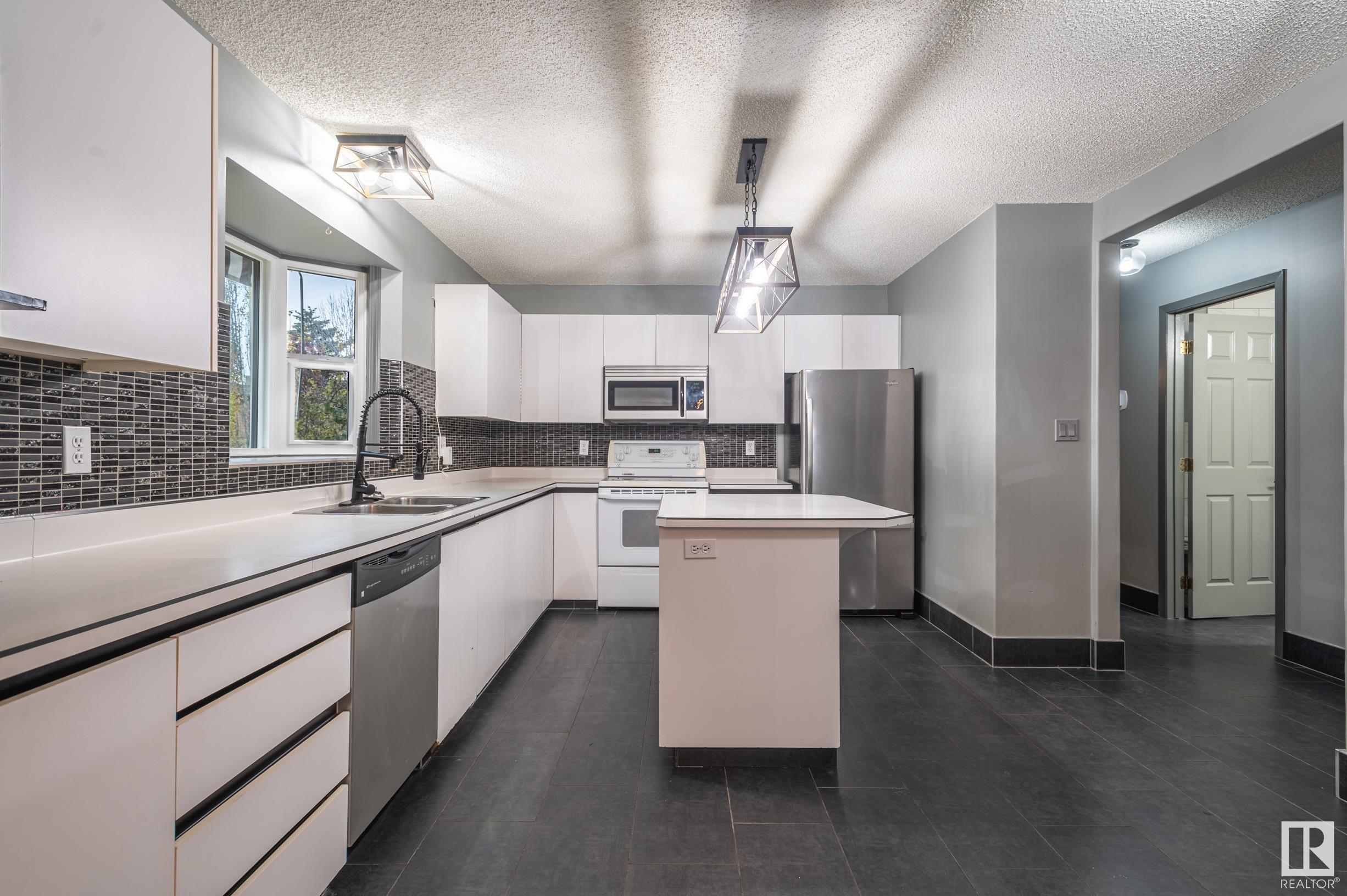      3811 21 AV NW , Edmonton,  ,T6L 4T4 ;  Listing Number: MLS E4420136