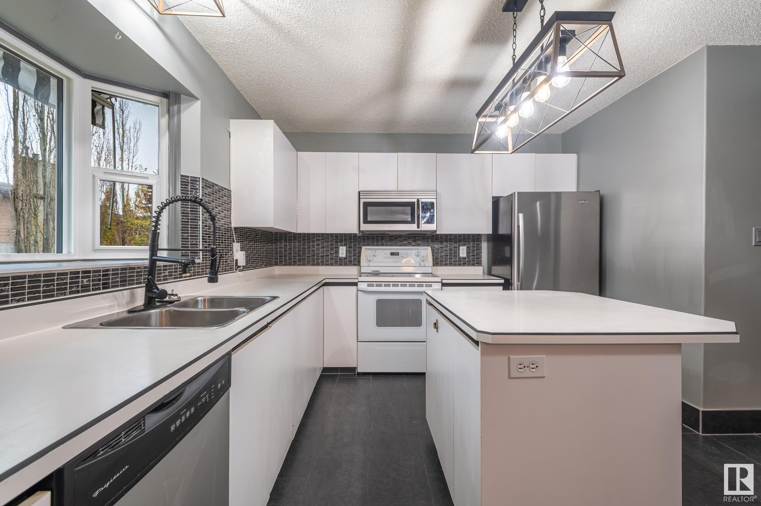      3811 21 AV NW , Edmonton,  ,T6L 4T4 ;  Listing Number: MLS E4420136