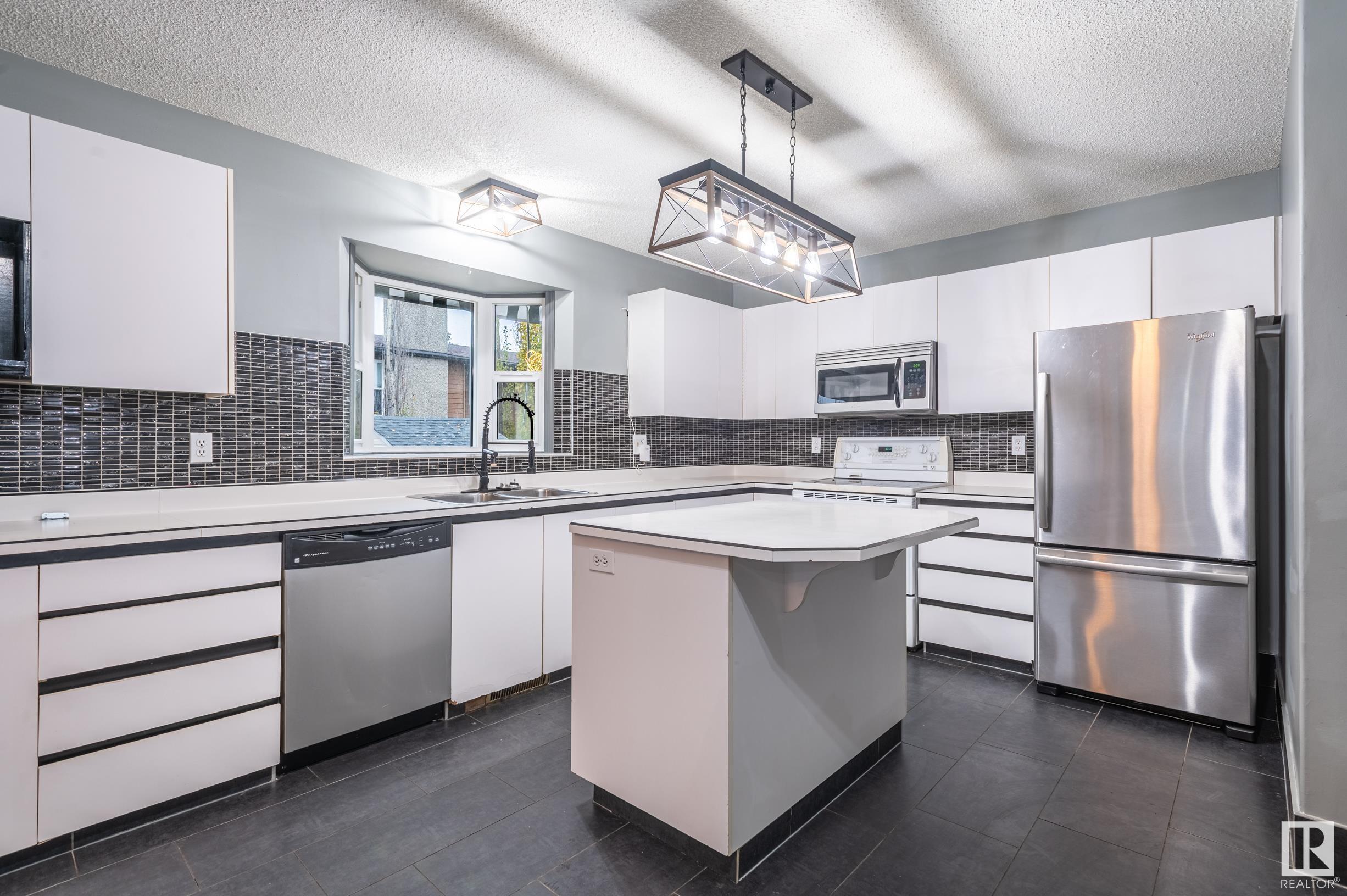      3811 21 AV NW , Edmonton,  ,T6L 4T4 ;  Listing Number: MLS E4420136