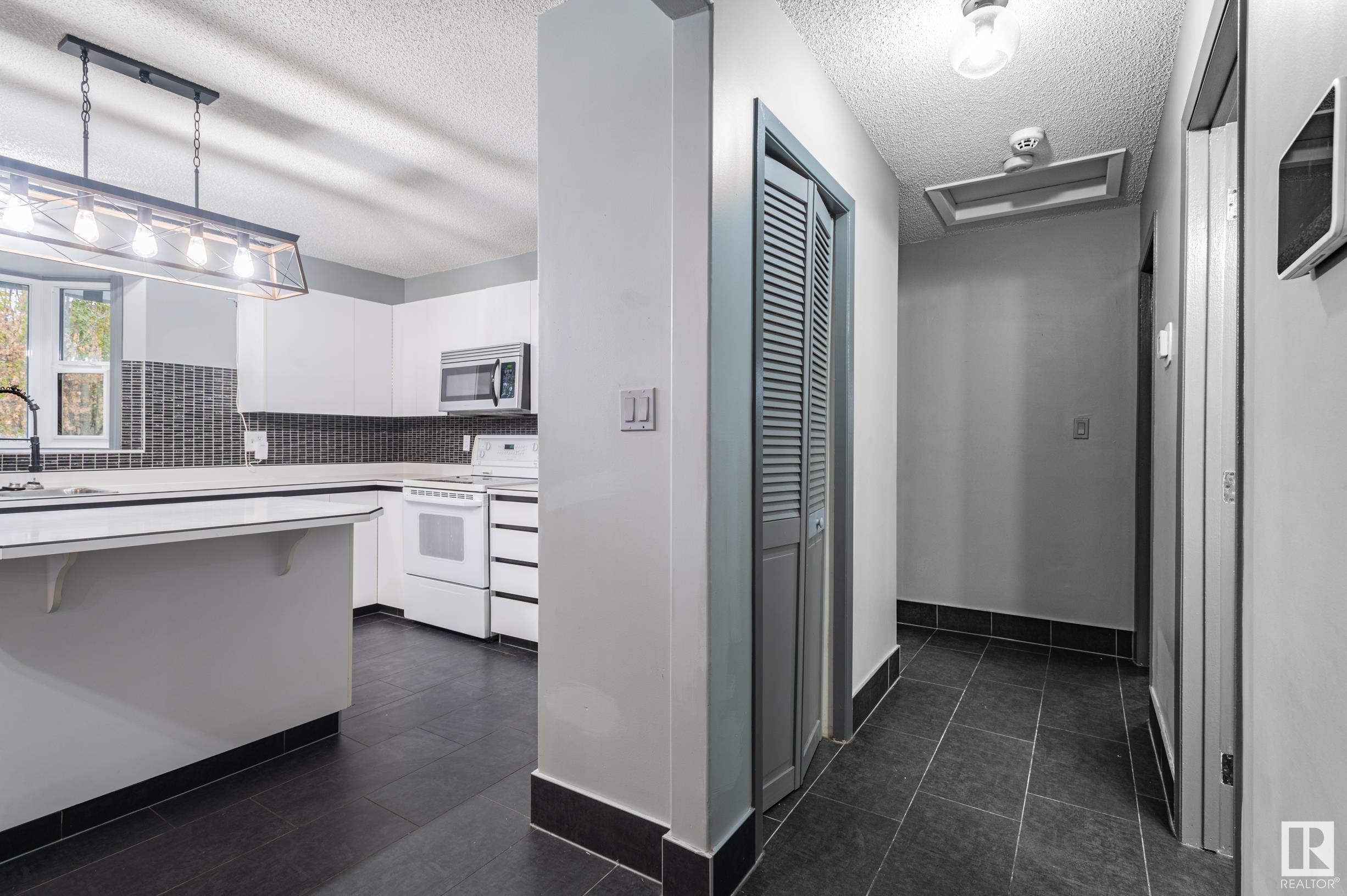      3811 21 AV NW , Edmonton,  ,T6L 4T4 ;  Listing Number: MLS E4420136