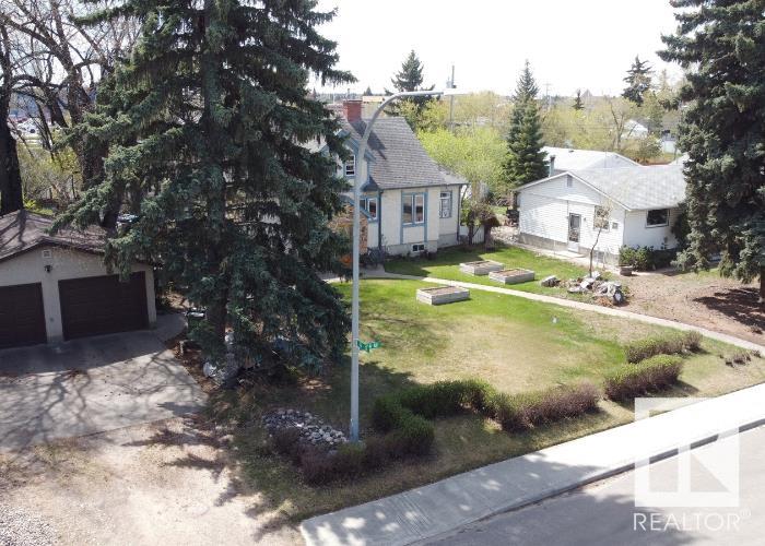 Photo 2 at 5203-5209 101a Avenue NW, Fulton Place, Edmonton