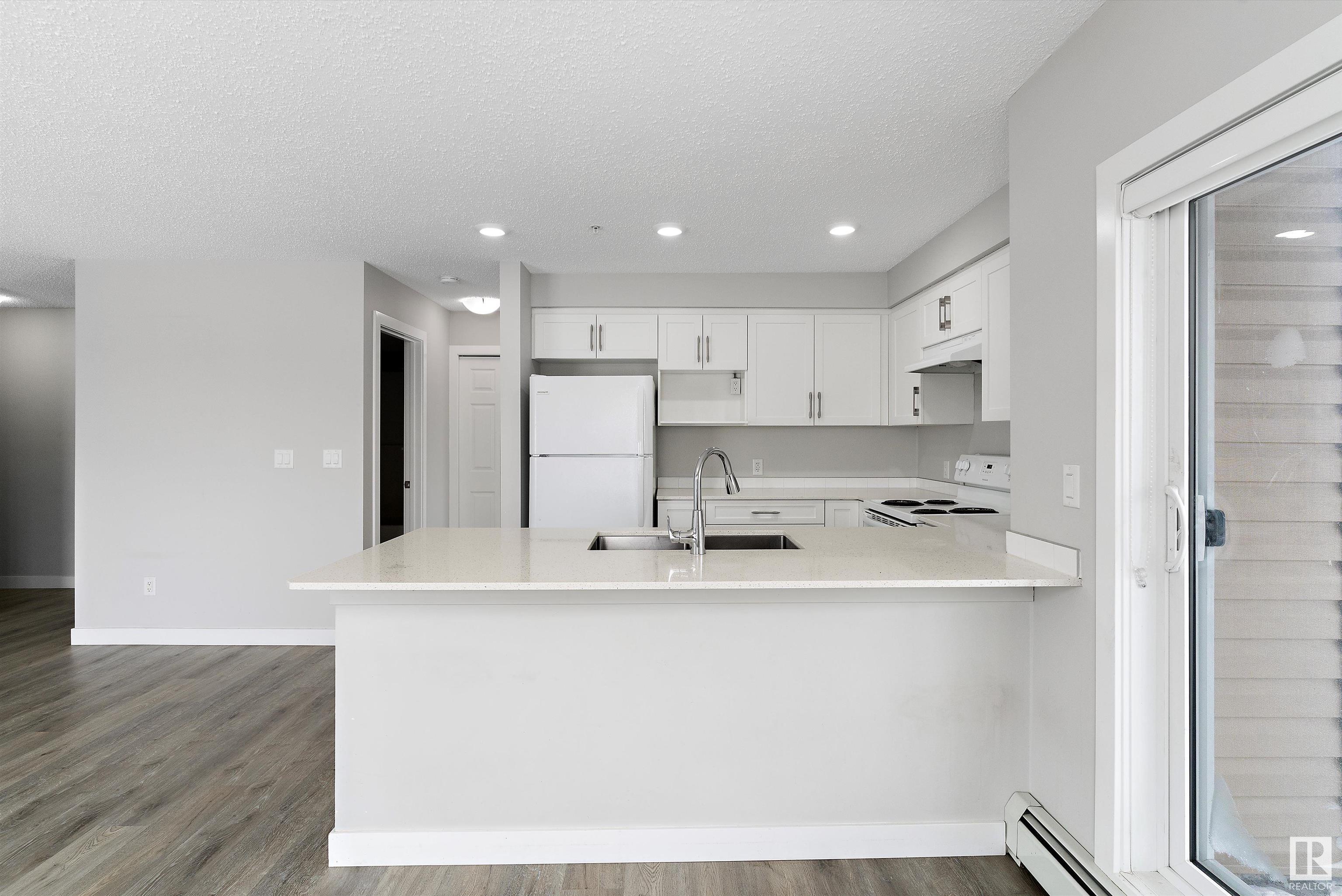      #318 11511 27 AV NW , Edmonton,  ,T6J 7J8 ;  Listing Number: MLS E4420400