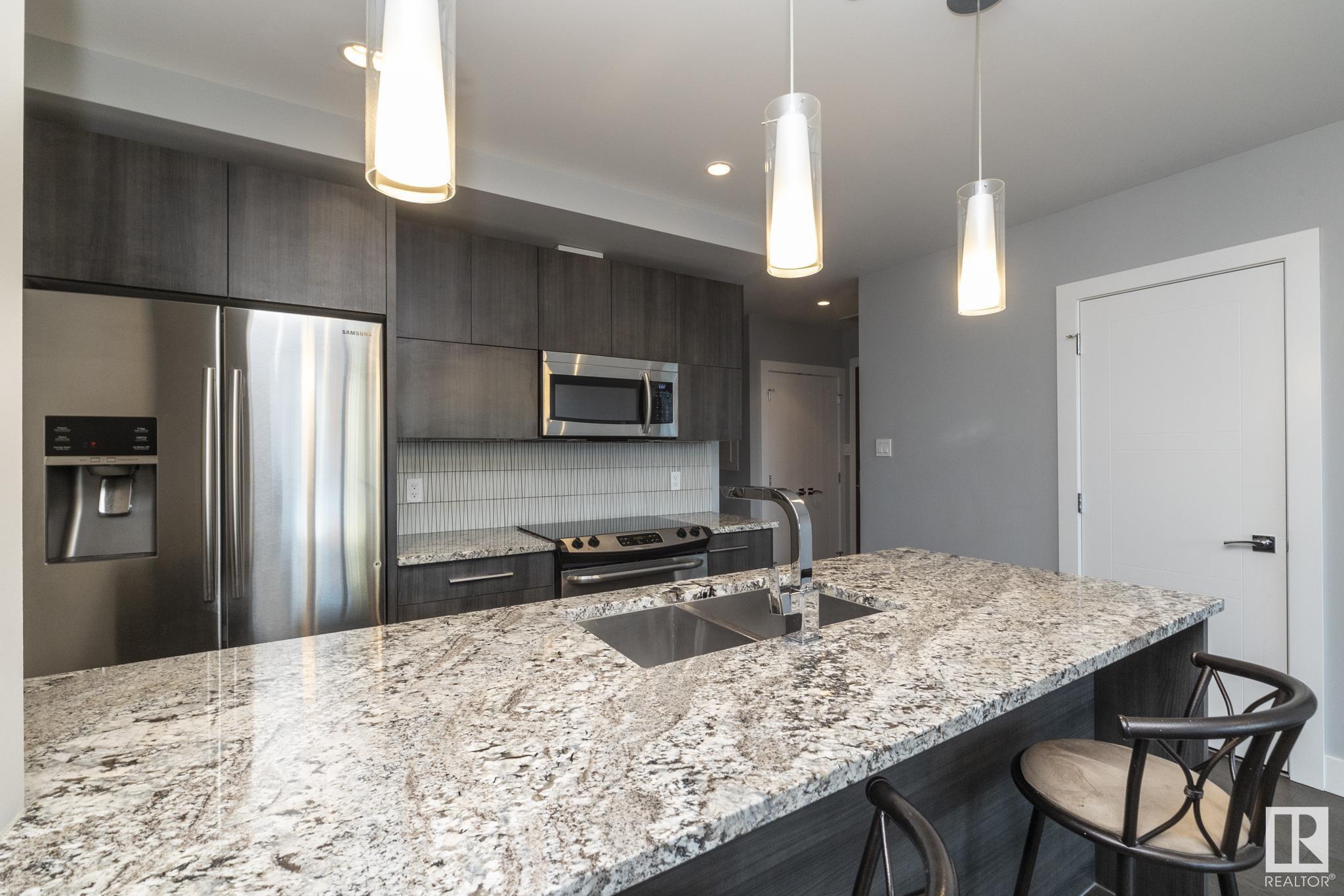      #202 11969 JASPER AV NW , Edmonton,  ,T5K 0P1 ;  Listing Number: MLS E4420518