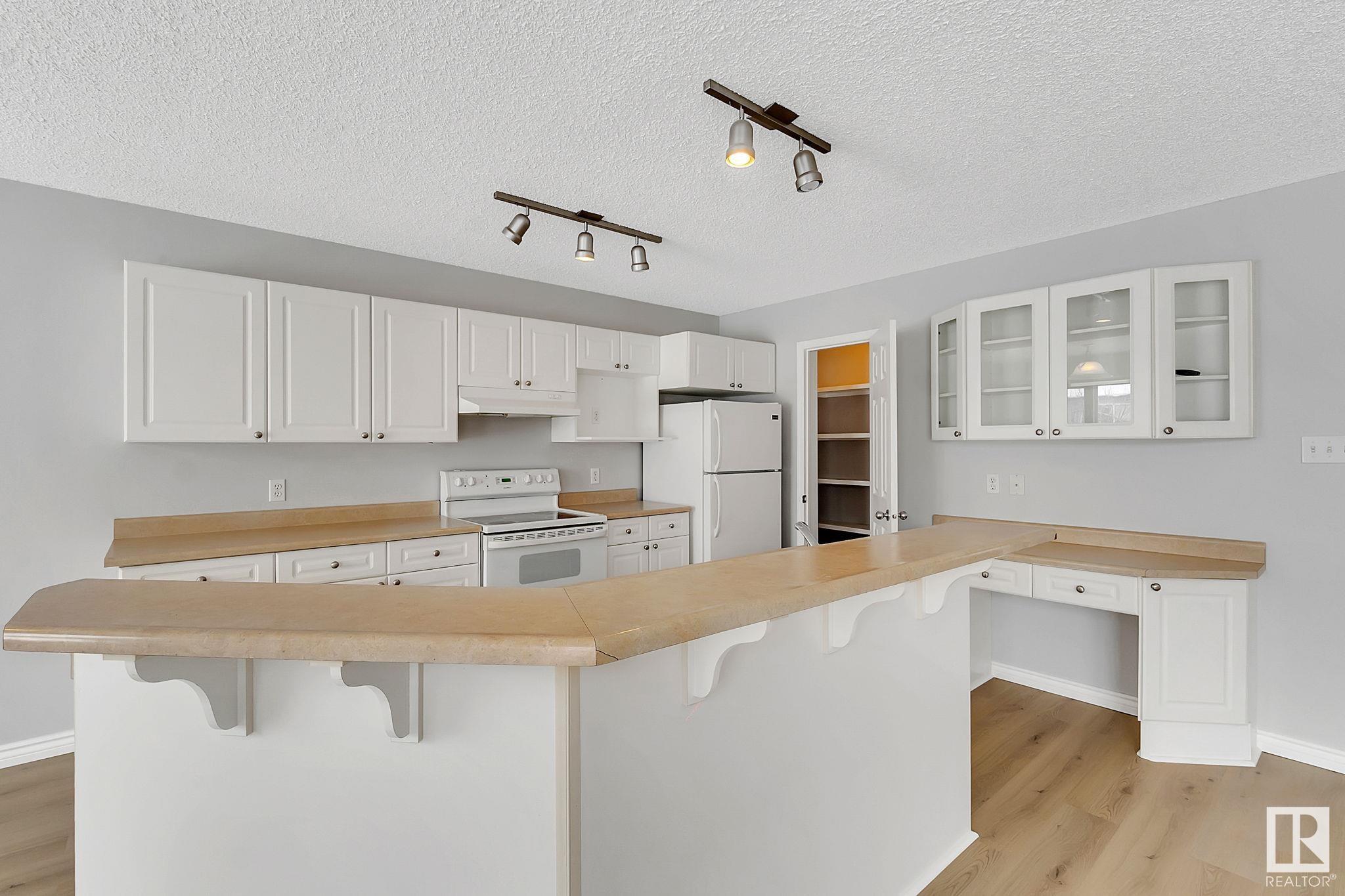 Photo 10 at 3771 23 Street NW, Wild Rose, Edmonton