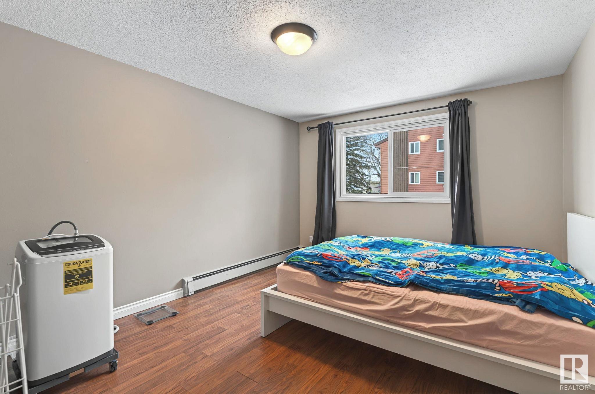      #203 11308 108 AV NW , Edmonton,  ,T5H 1B6 ;  Listing Number: MLS E4420799