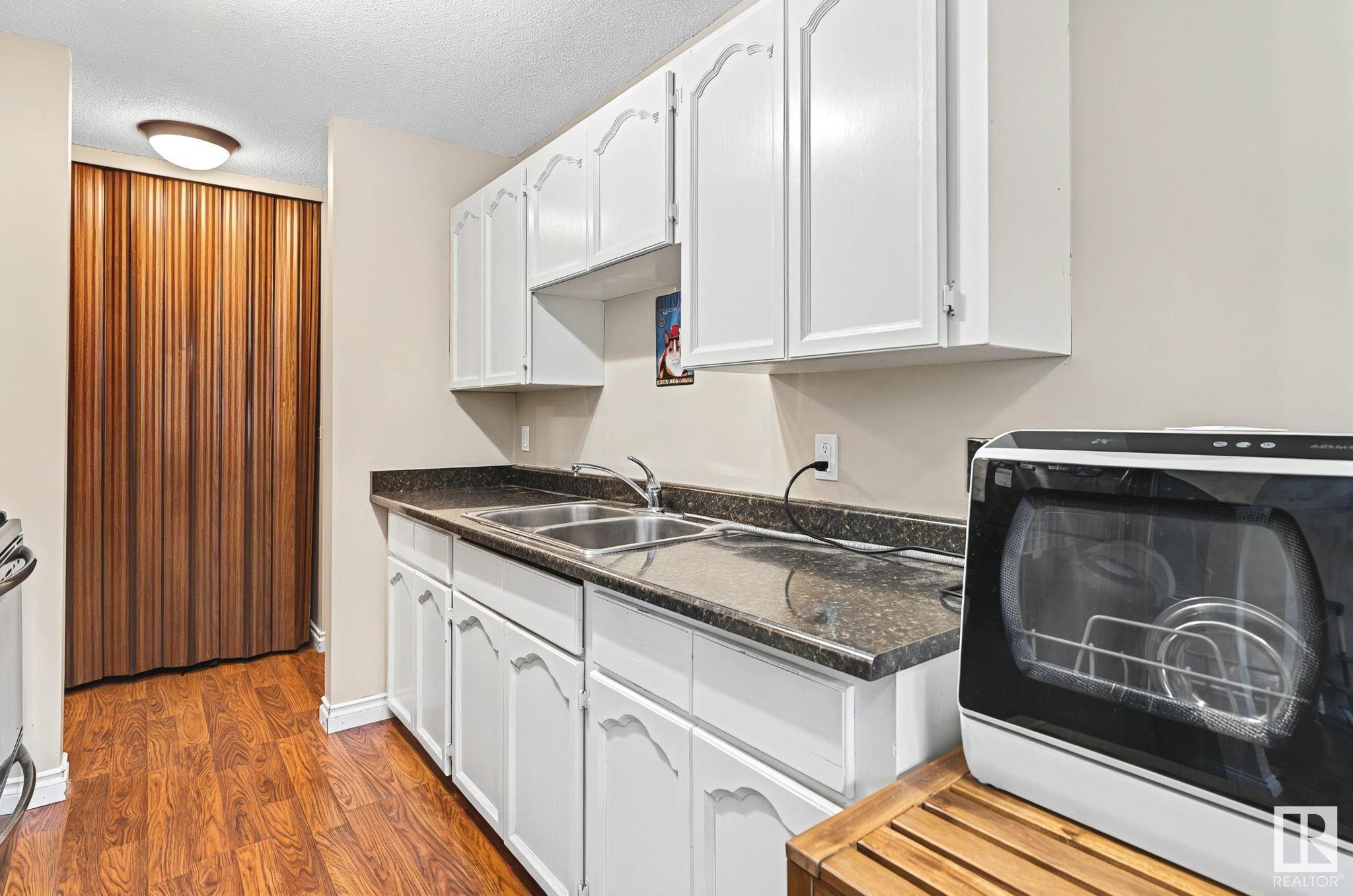      #203 11308 108 AV NW , Edmonton,  ,T5H 1B6 ;  Listing Number: MLS E4420799