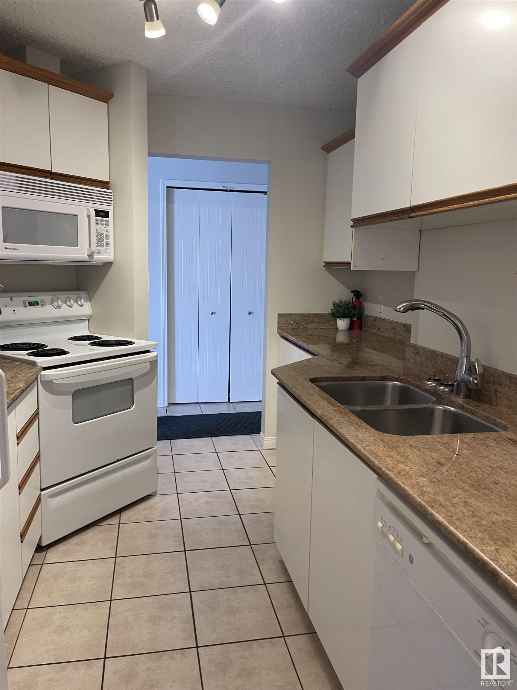 Photo 3 at 6310 101 Avenue NW, Fulton Place, Edmonton