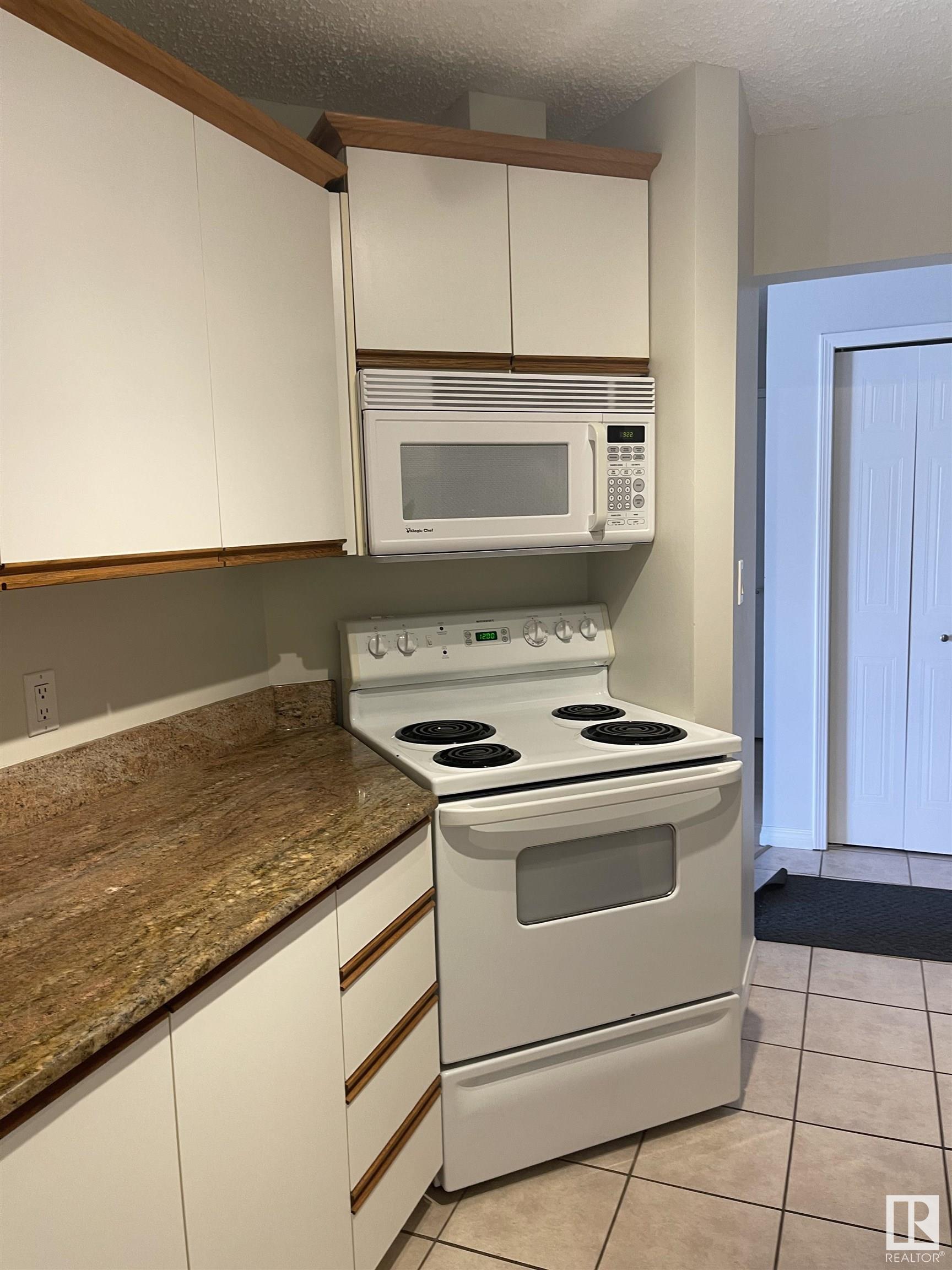 Photo 4 at 6310 101 Avenue NW, Fulton Place, Edmonton