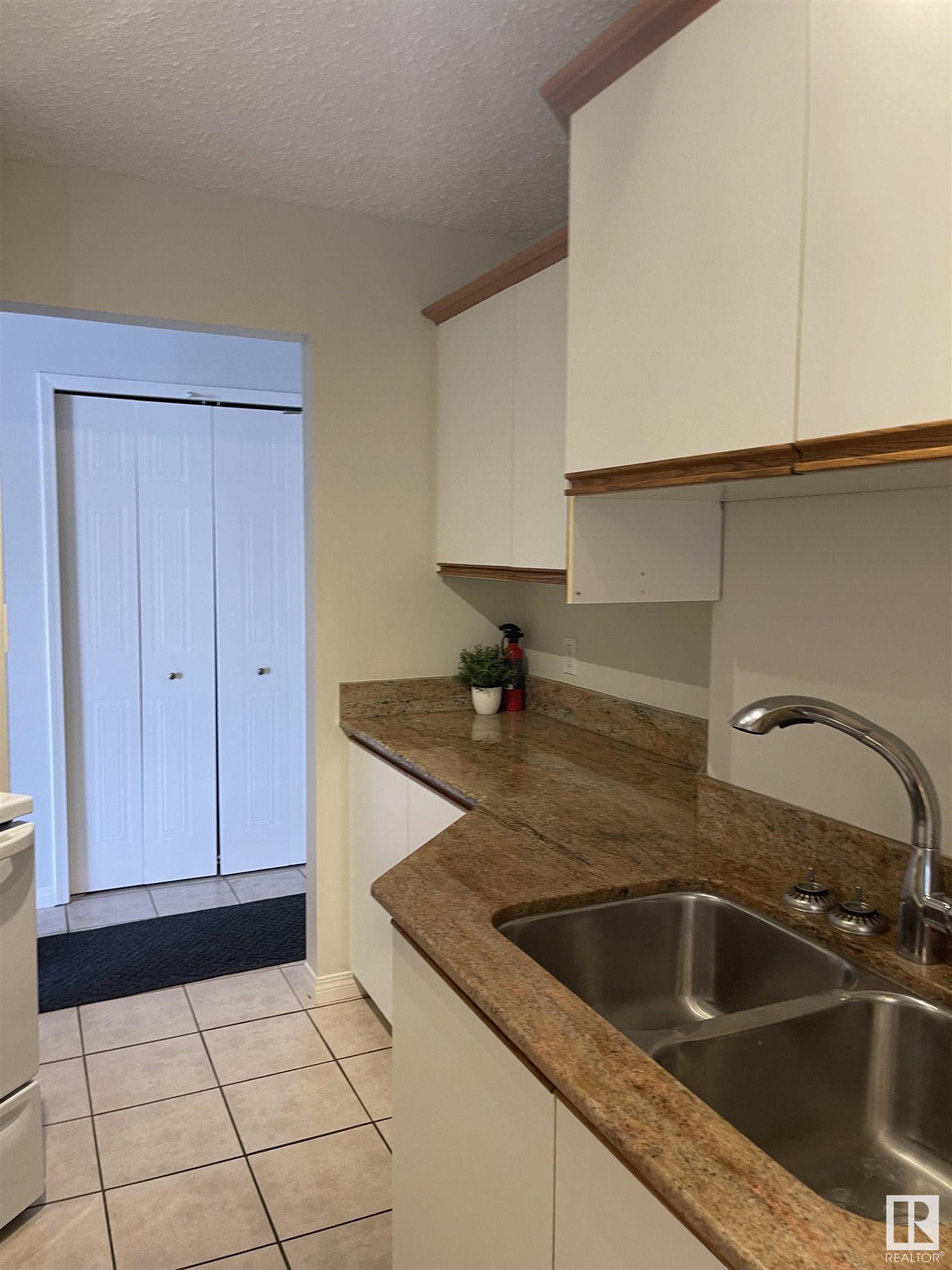 Photo 5 at 6310 101 Avenue NW, Fulton Place, Edmonton