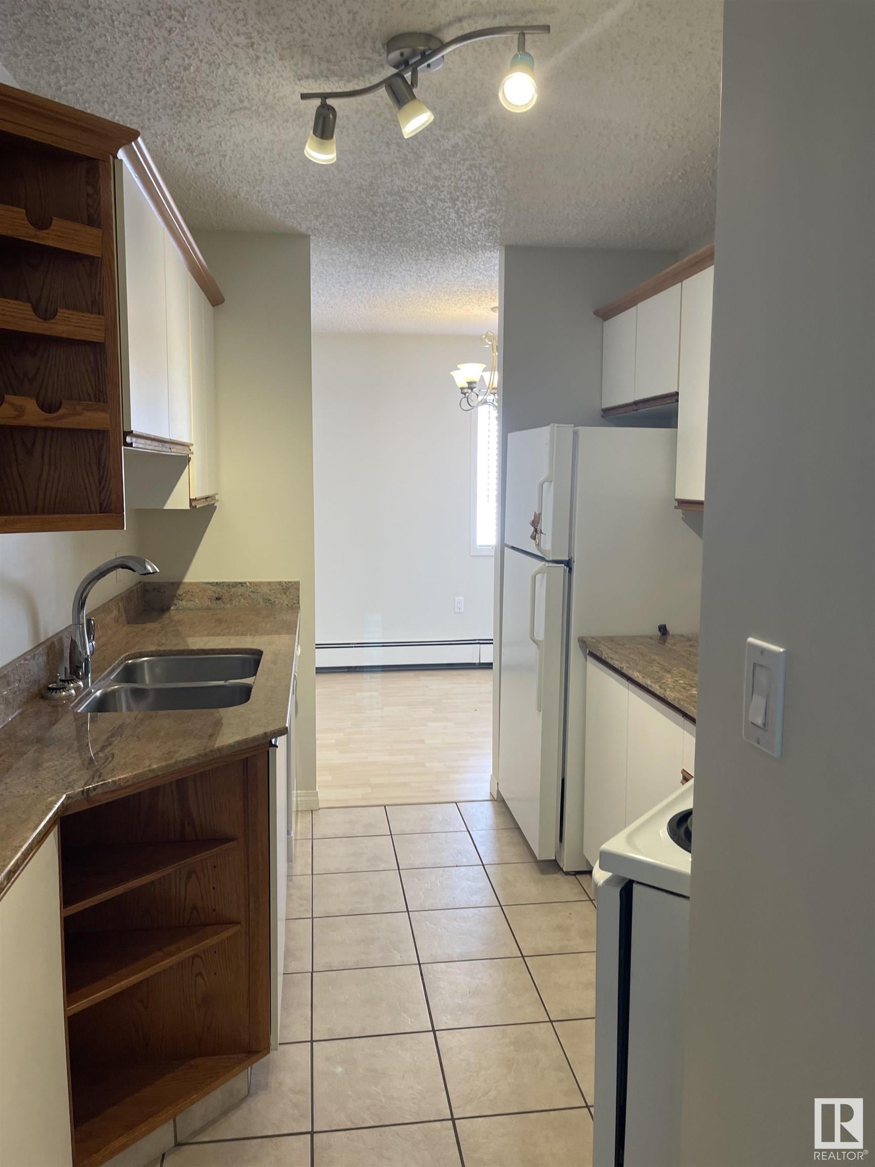 Photo 7 at 6310 101 Avenue NW, Fulton Place, Edmonton