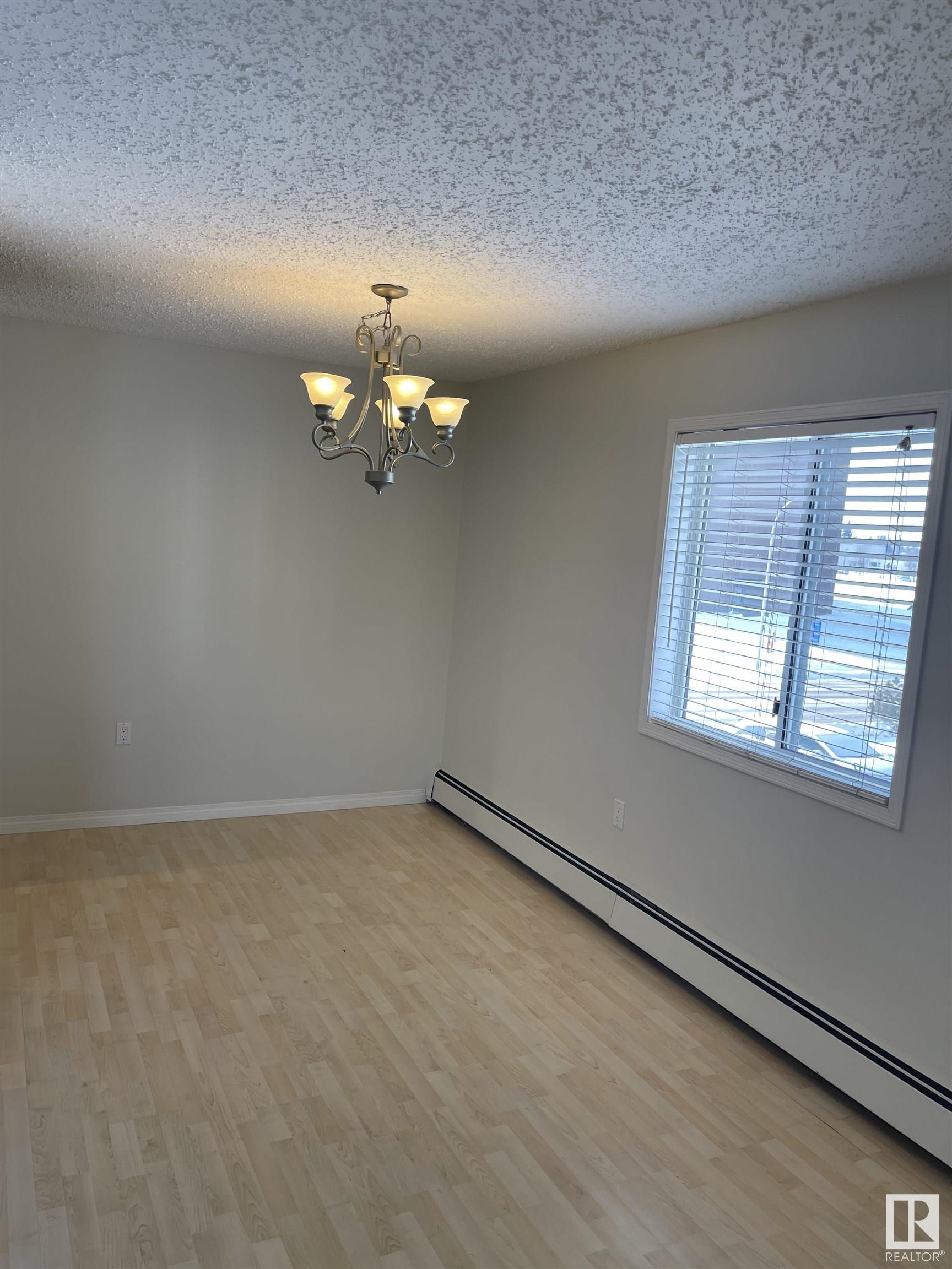 Photo 9 at 6310 101 Avenue NW, Fulton Place, Edmonton