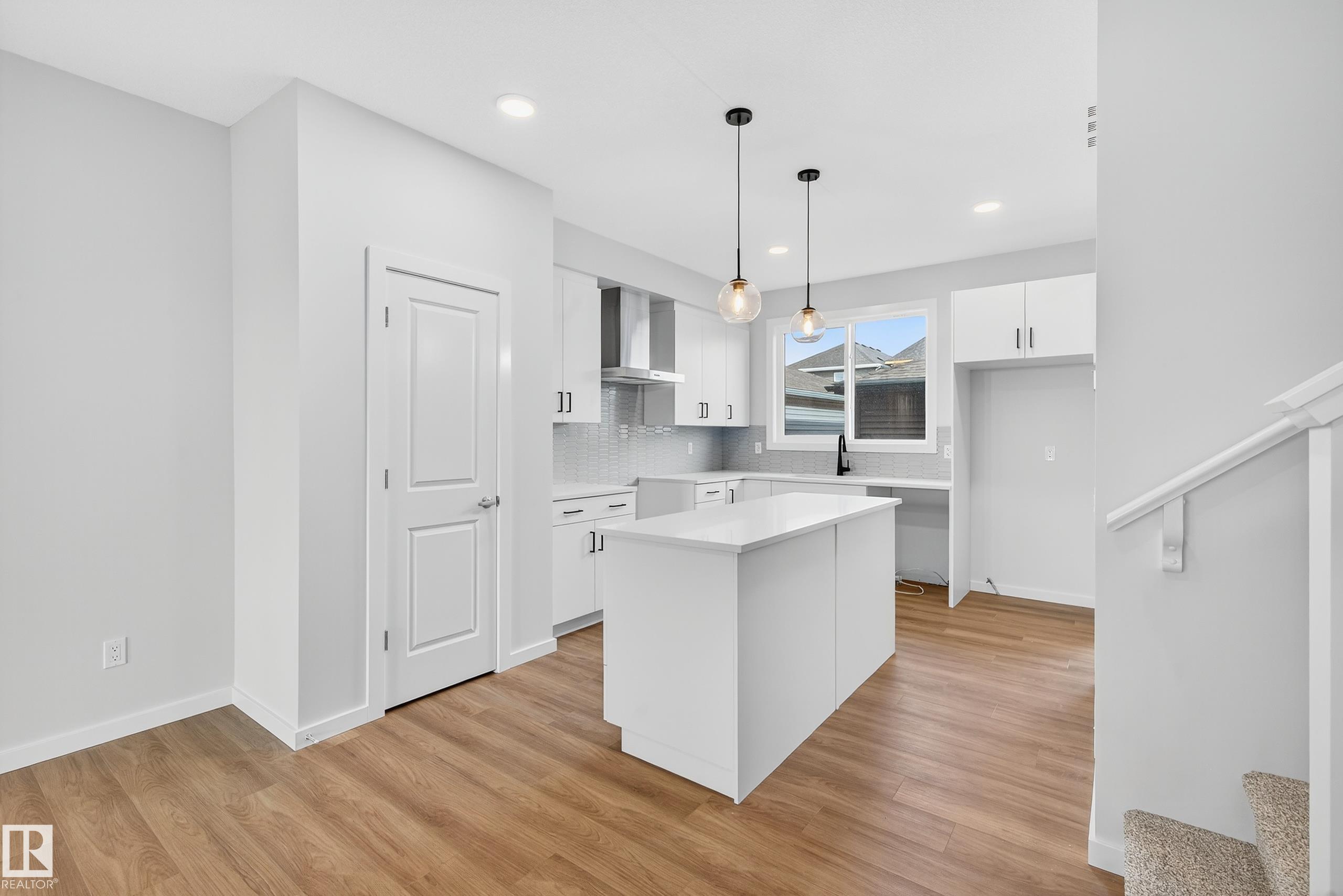 Introducing the ?SASHA? by master builder, HOMES BY AVI. Exceptional 2 storey home in the heart of Southfork Leduc with upscale, functional design that is perfect location for your growing family! Great schools, parks & all amenities just a hop away! This charming, BRAND NEW, 2 storey home w/front porch boasts SEPARATE SIDE ENTRANCE, 3 bedrooms, 2.5 baths, pocket office, upper-level loft style family room & laundry closet. Open concept main level floor plan w/stunning design highlights welcoming foyer, spacious living/dining area, deluxe kitchen w/center island, appliance allowance, chimney hood fan & built-in microwave. Private owners suite w/luxurious 3-pc ensuite showcases upgraded shower & WIC. 2 spacious junior rooms & 4pc bath. Numerous upgrades throughout including, quartz countertops, upgraded lighting/fixtures, luxury vinyl plank flooring, plush carpet upper level, 9' ceiling height in basement, HRV System. Full landscaping & detached double garage...CHECK! MUST SEE HOME!