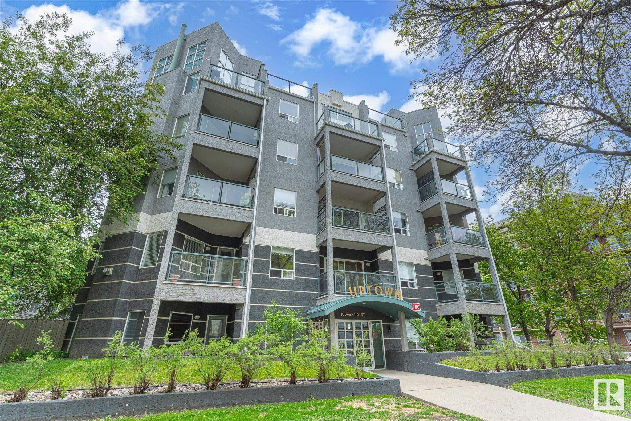 Located in the ultra convenient Grandin area of Oliver which is one of Edmonton's most sought after communities. Centrally located, you are within one block of a grocery store, the LRT (light rail transit) Government Centre stop, restaurants, the river valley trail system, and so much more! Excellent setup for students with University of Alberta, Grant MacEwan and NAIT easily accessible by public transit. This open plan 2 bedroom, 2 bathroom unit is perfect for room mates with tons of storage space, in-suite laundry,  balcony with natural gas hook up. The interior has a spacious feel with 9 foot ceilings and includes upgraded finishes such as in floor heating, ceramic tile flooring, newer carpet (2023), Hunter Douglas blinds, and a gas fireplace. The unit also includes a titled heated underground parking stall (#44).  Quick possession is available.